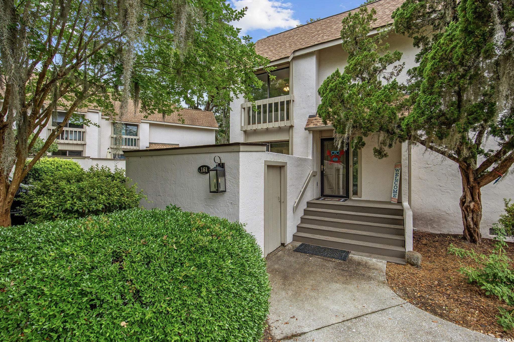 64 Bamboo Loop, Unit 161 Georgetown, SC 29440 - Photo 1 of 31 Entrance to property with stucco siding