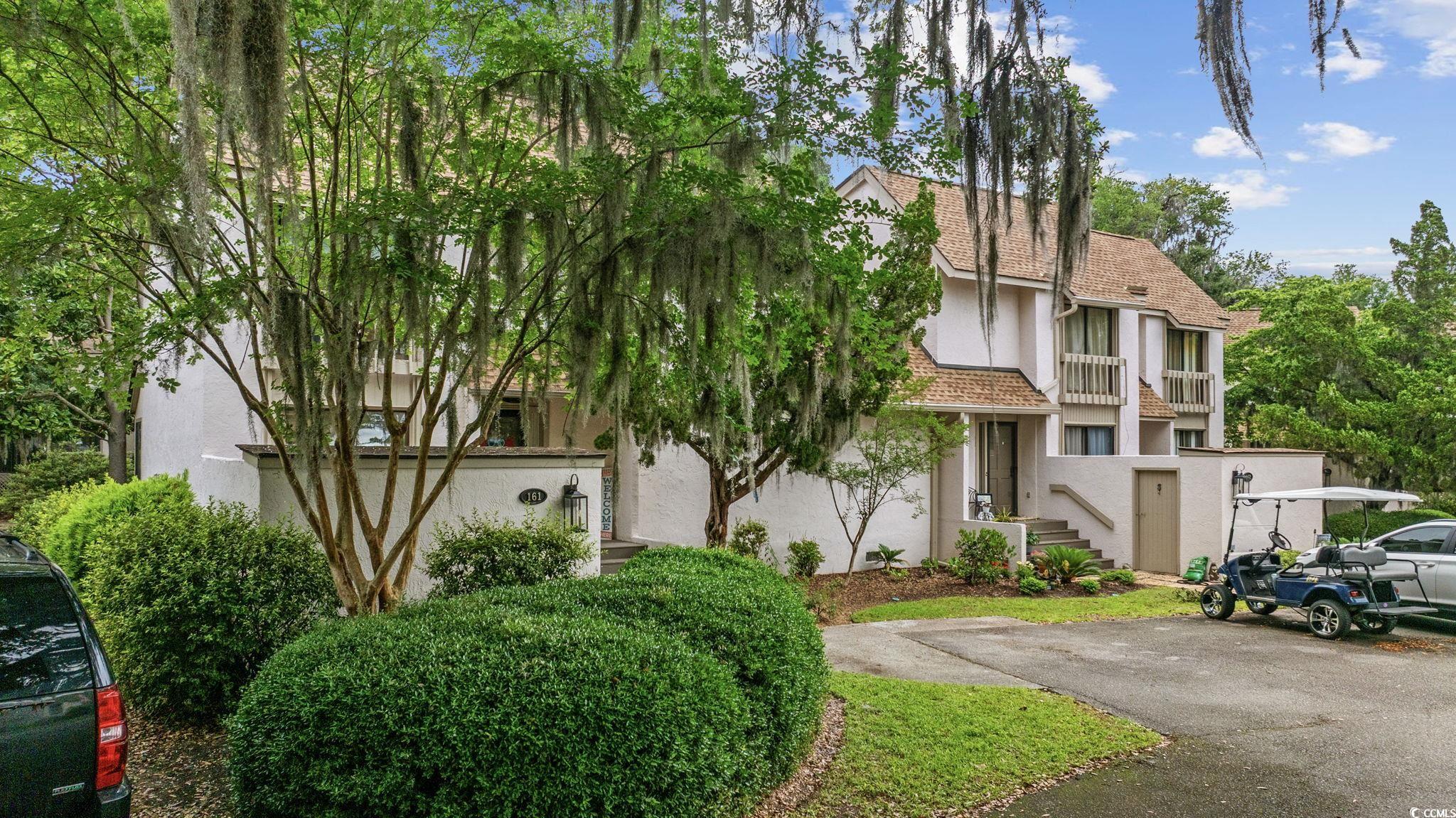 64 Bamboo Loop, Unit 161 Georgetown, SC 29440 - Photo 2 of 31 View of front of house featuring stucco siding