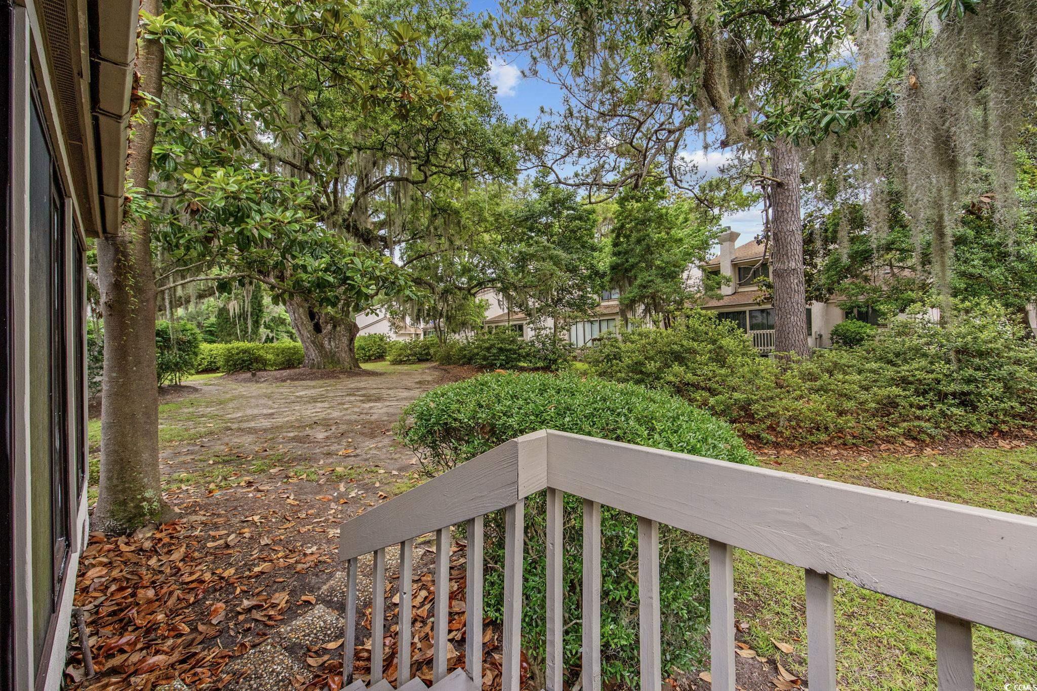 64 Bamboo Loop, Unit 161 Georgetown, SC 29440 - Photo 21 of 31 View of yard with a balcony