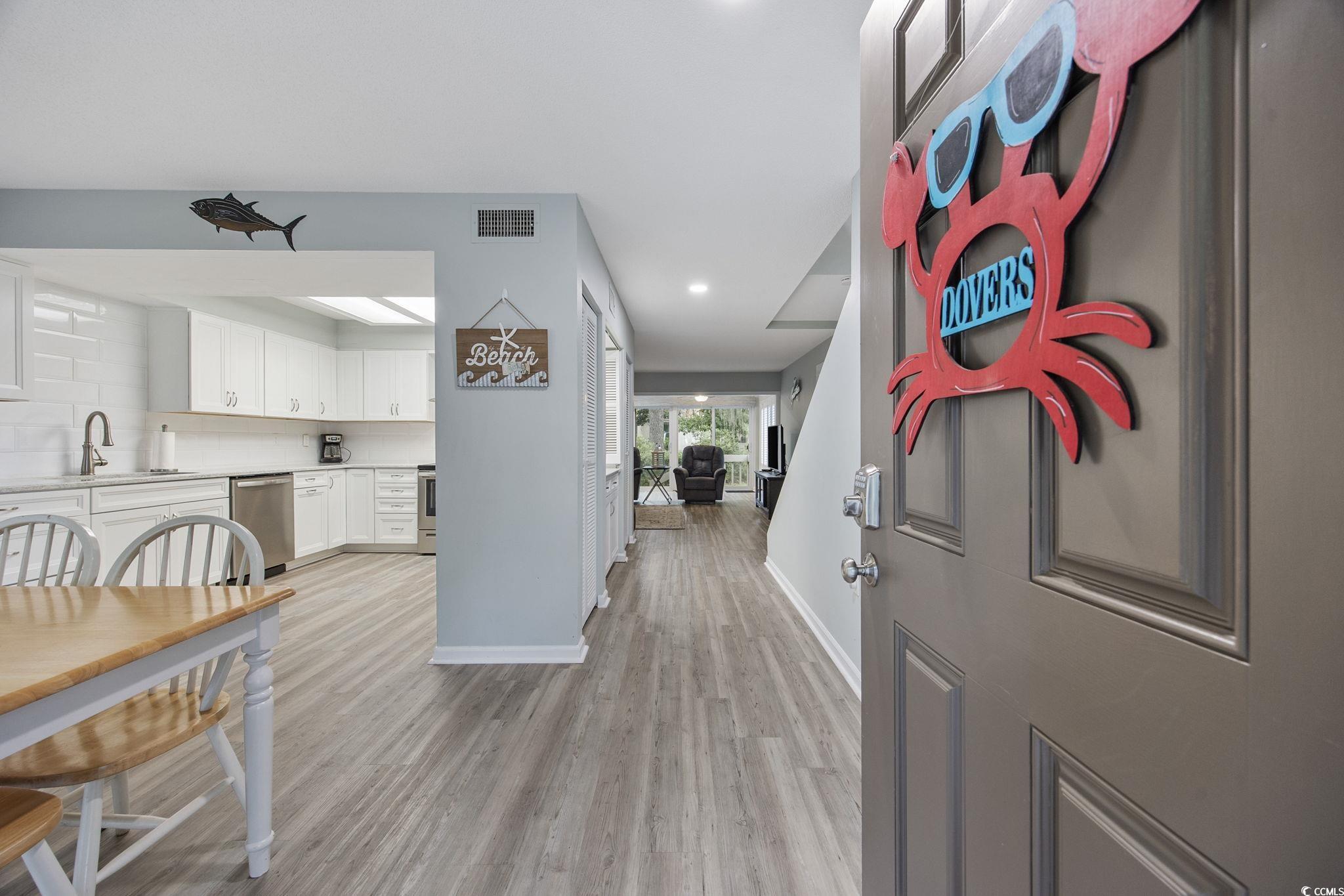 64 Bamboo Loop, Unit 161 Georgetown, SC 29440 - Photo 7 of 31 Foyer entrance featuring light wood-style floors, baseboards, and recessed lighting