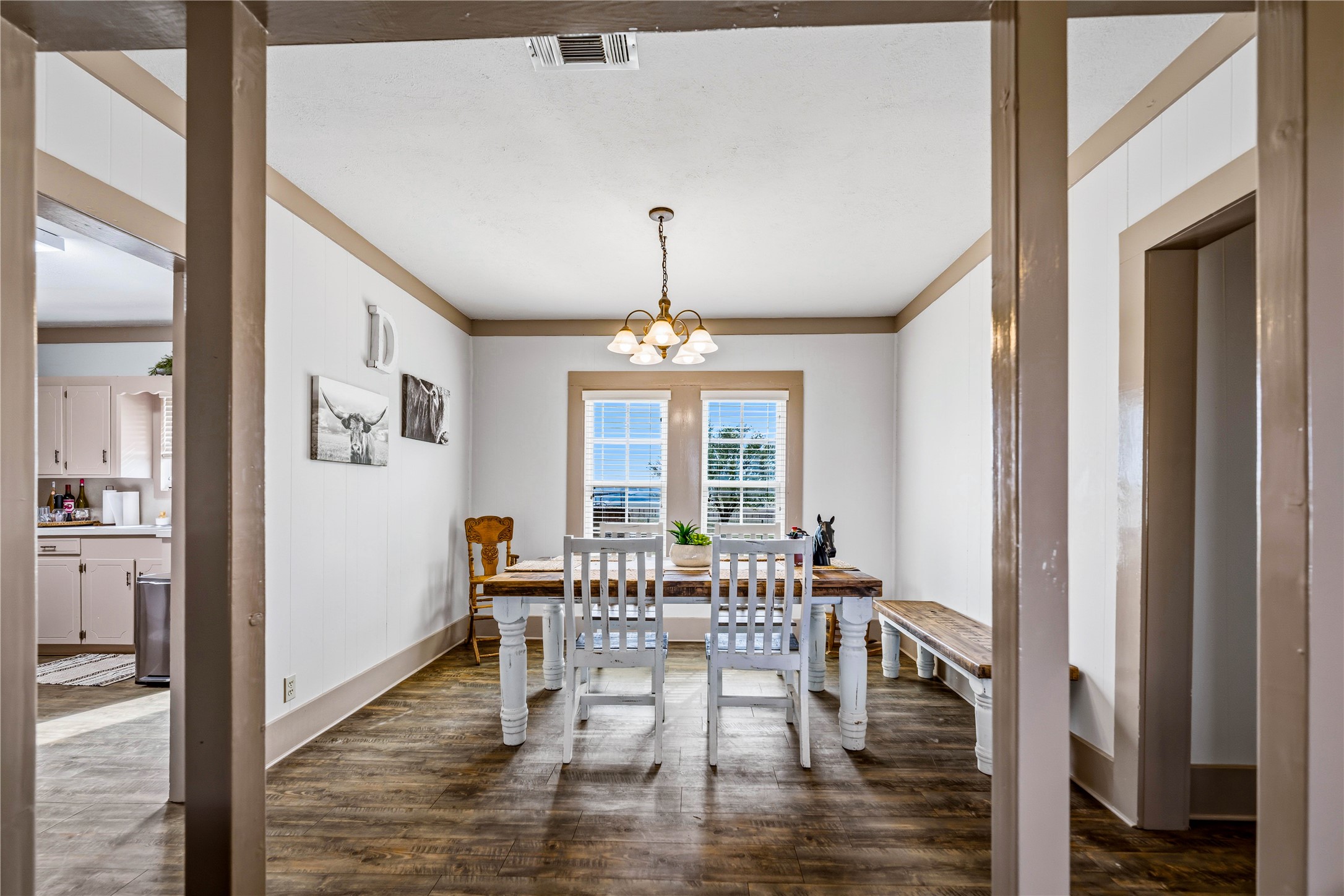 1119 Wolters Road Schulenburg, TX 78956 - Photo 15 of 39 a view of a dining room with furniture window and wooden floor
