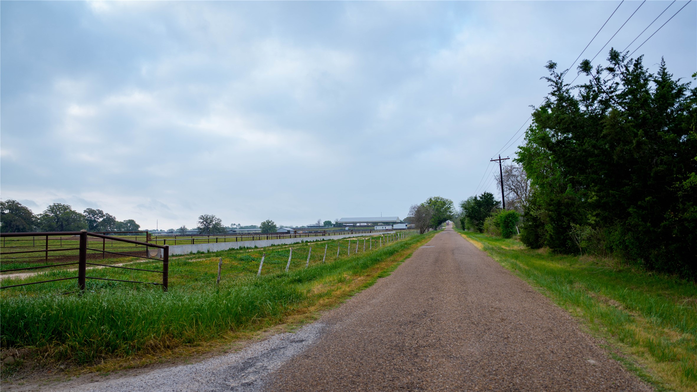 1119 Wolters Road Schulenburg, TX 78956 - Photo 20 of 39 a view of a road with a big yard