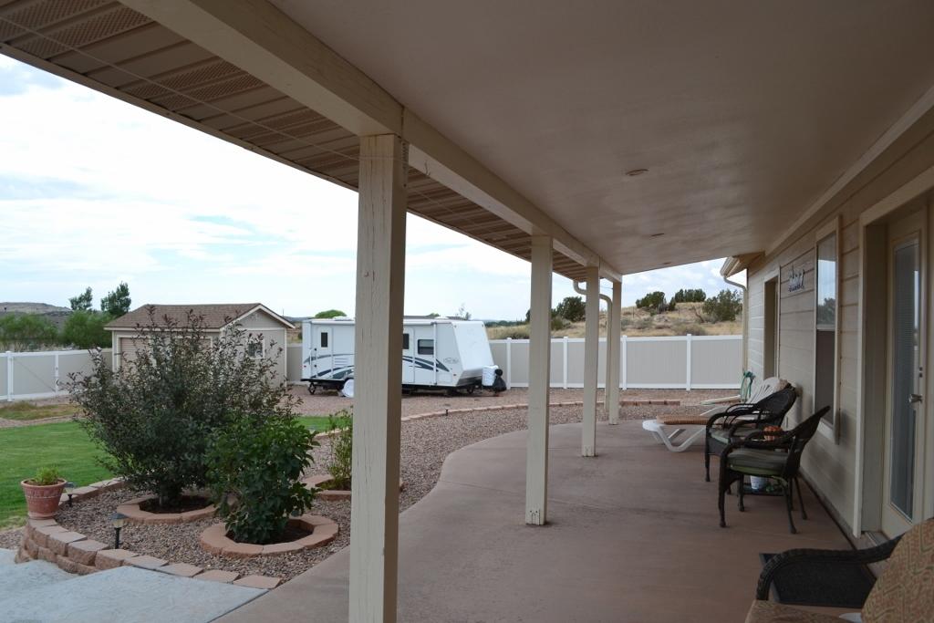 2772 Mason Ridge Road Show Low, AZ 85901 - Photo 27 of 51 a view of a porch with furniture and garden