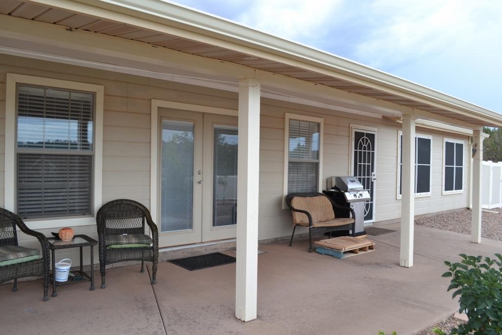 2772 Mason Ridge Road Show Low, AZ 85901 - Photo 43 of 51 a view of a room with gym equipment and a large window