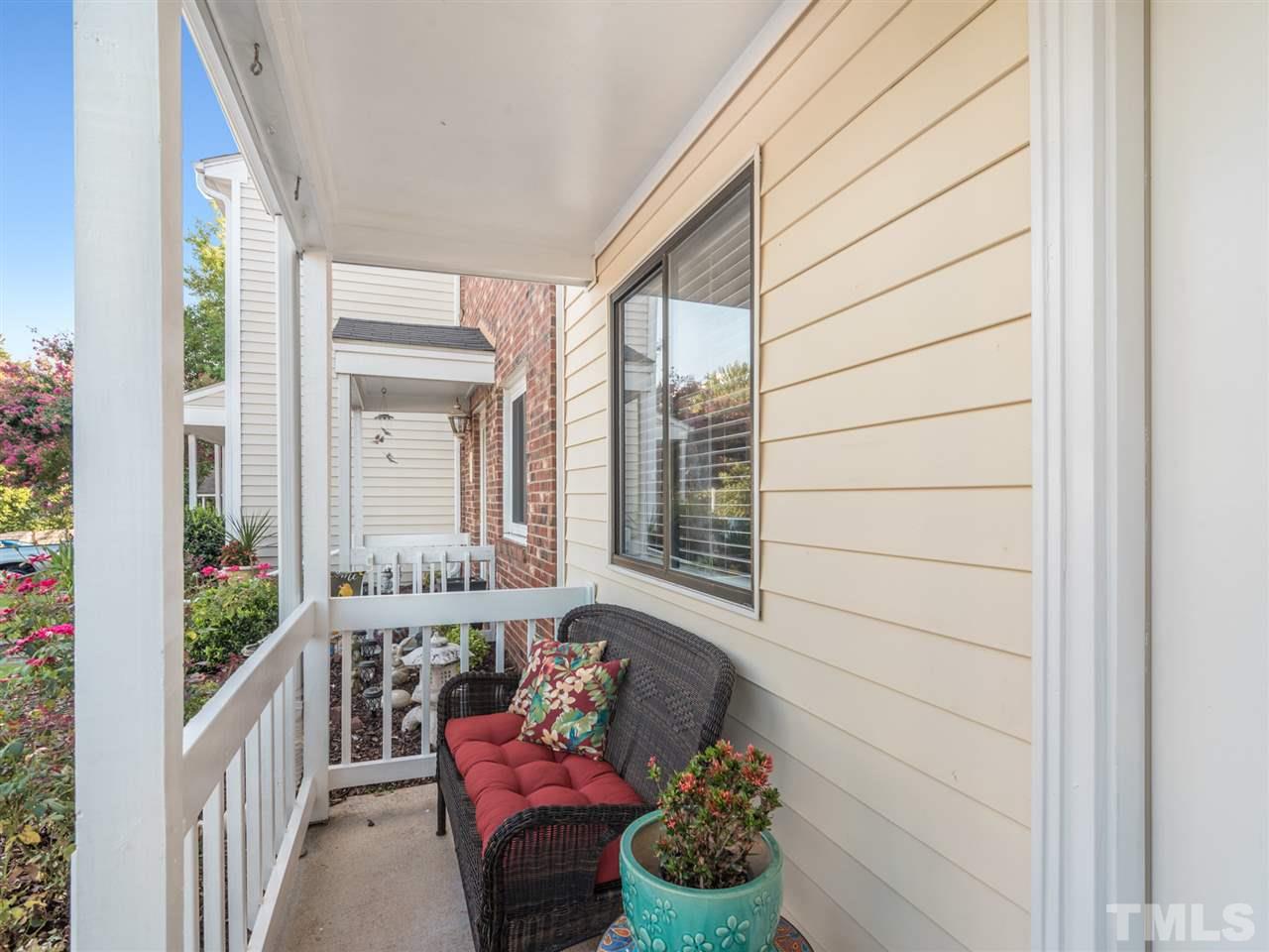 5932 Shady Grove Circle Raleigh, NC 27609 - Photo 2 of 28 a outdoor living space with furniture and garden view