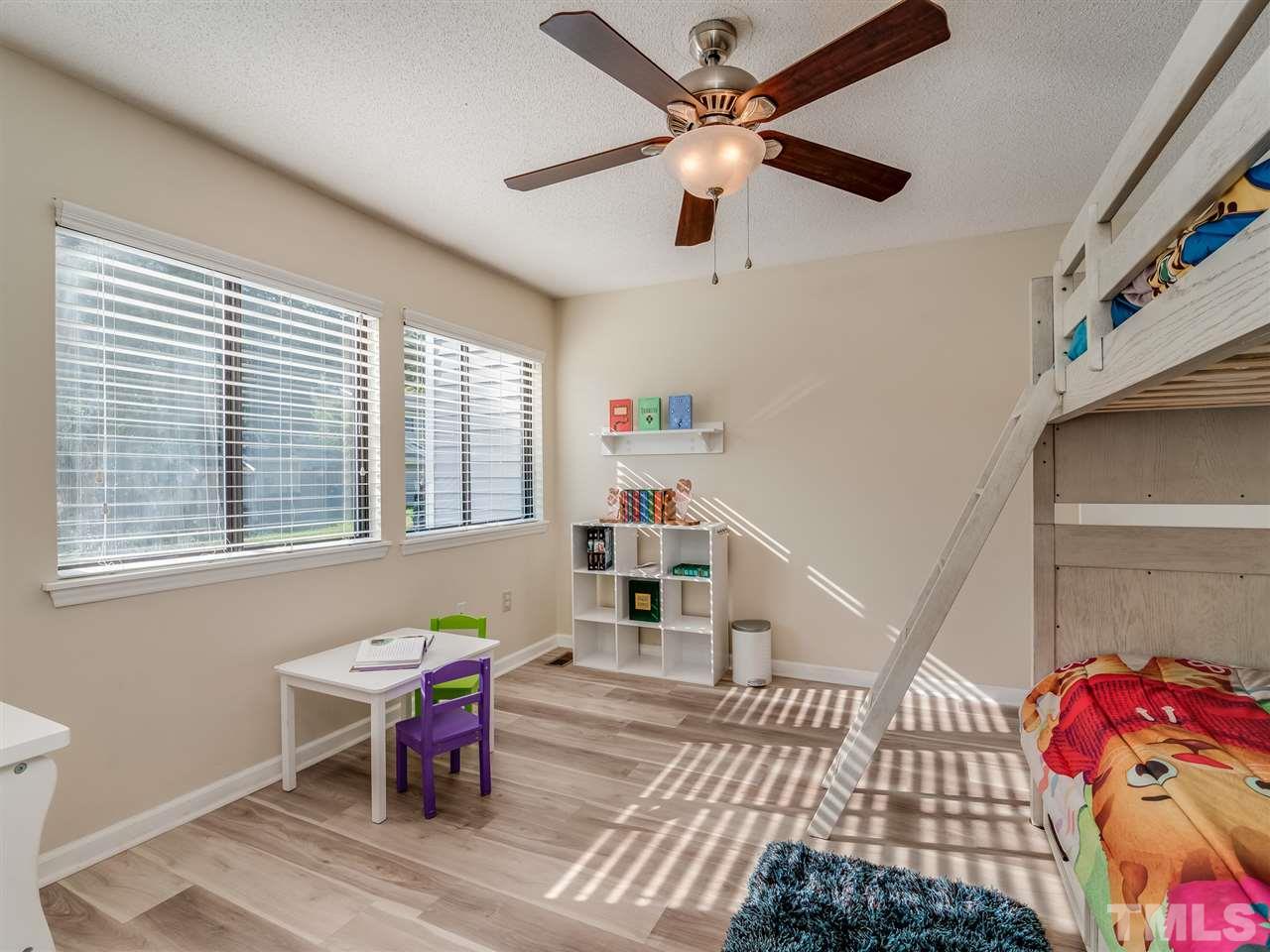 5932 Shady Grove Circle Raleigh, NC 27609 - Photo 25 of 28 a bedroom with furniture and a window