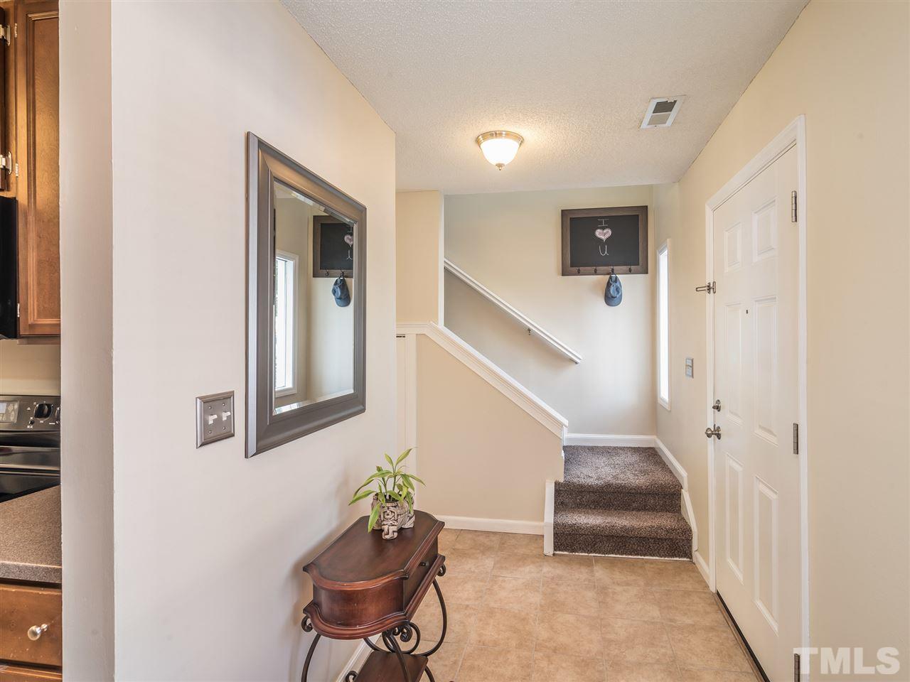 5932 Shady Grove Circle Raleigh, NC 27609 - Photo 3 of 28 a view of entryway with livingroom and furniture