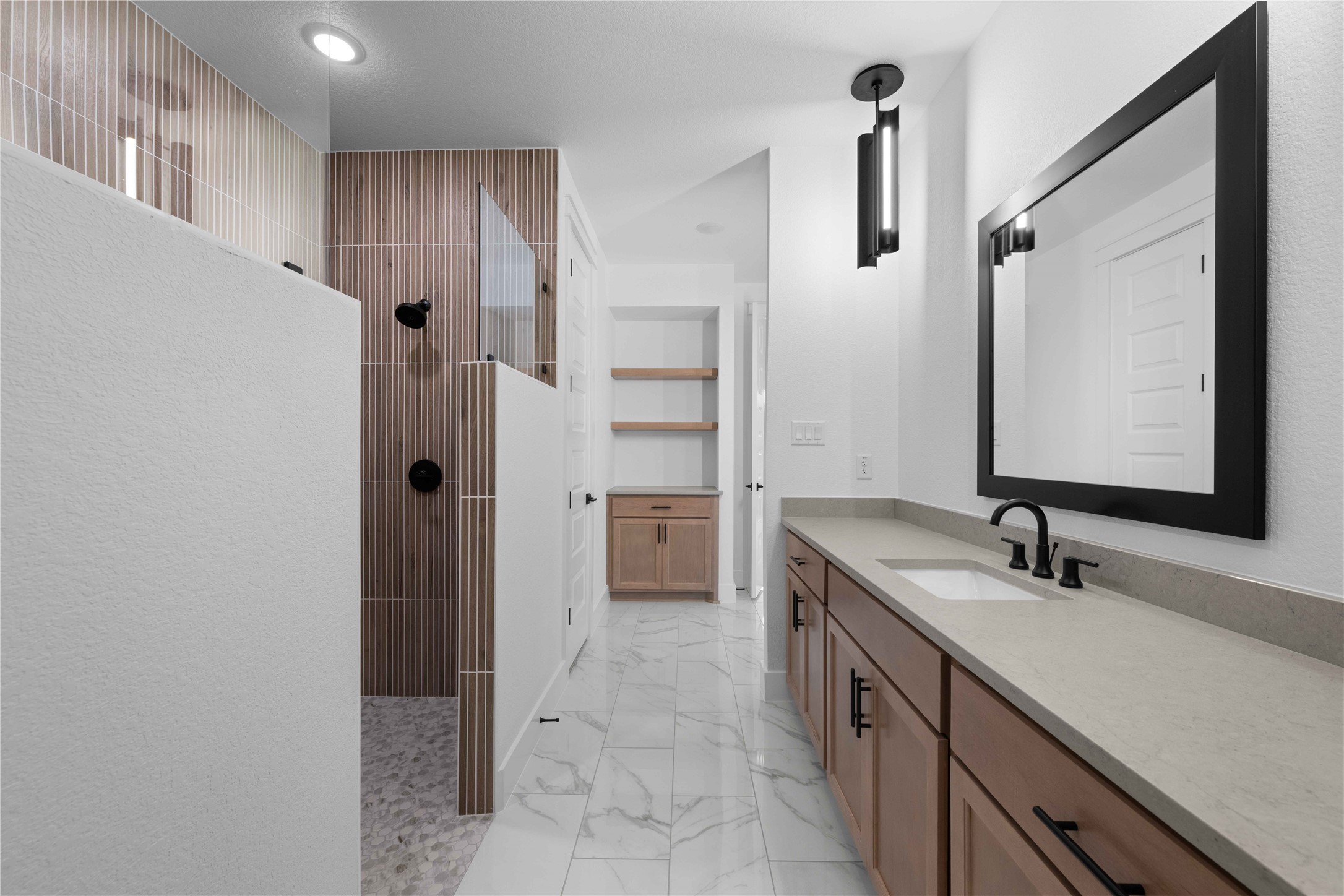 520 Vale Pond Spur Georgetown, TX 78633 - Photo 13 of 32 a bathroom with a double vanity sink a and mirror
