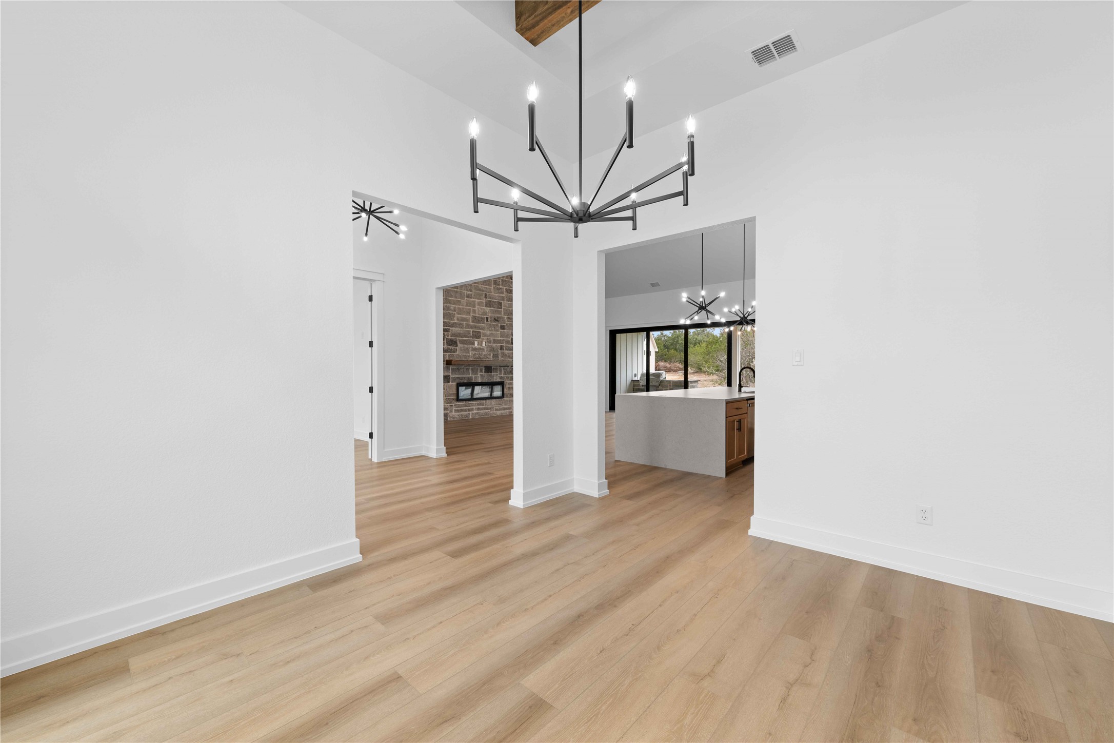 520 Vale Pond Spur Georgetown, TX 78633 - Photo 22 of 32 wooden floor in an empty room with a window