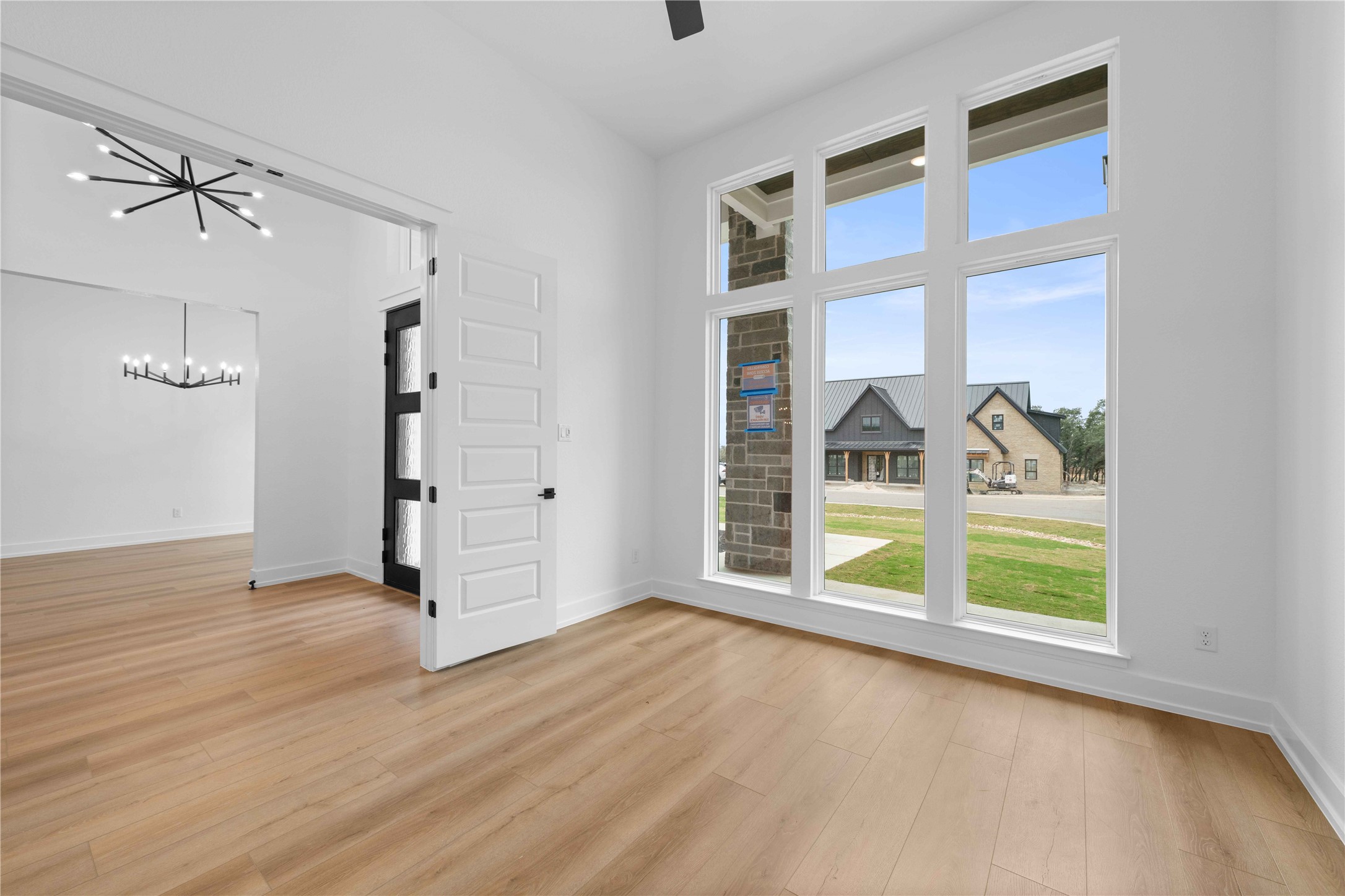 520 Vale Pond Spur Georgetown, TX 78633 - Photo 24 of 32 an empty room with wooden floor closet and windows