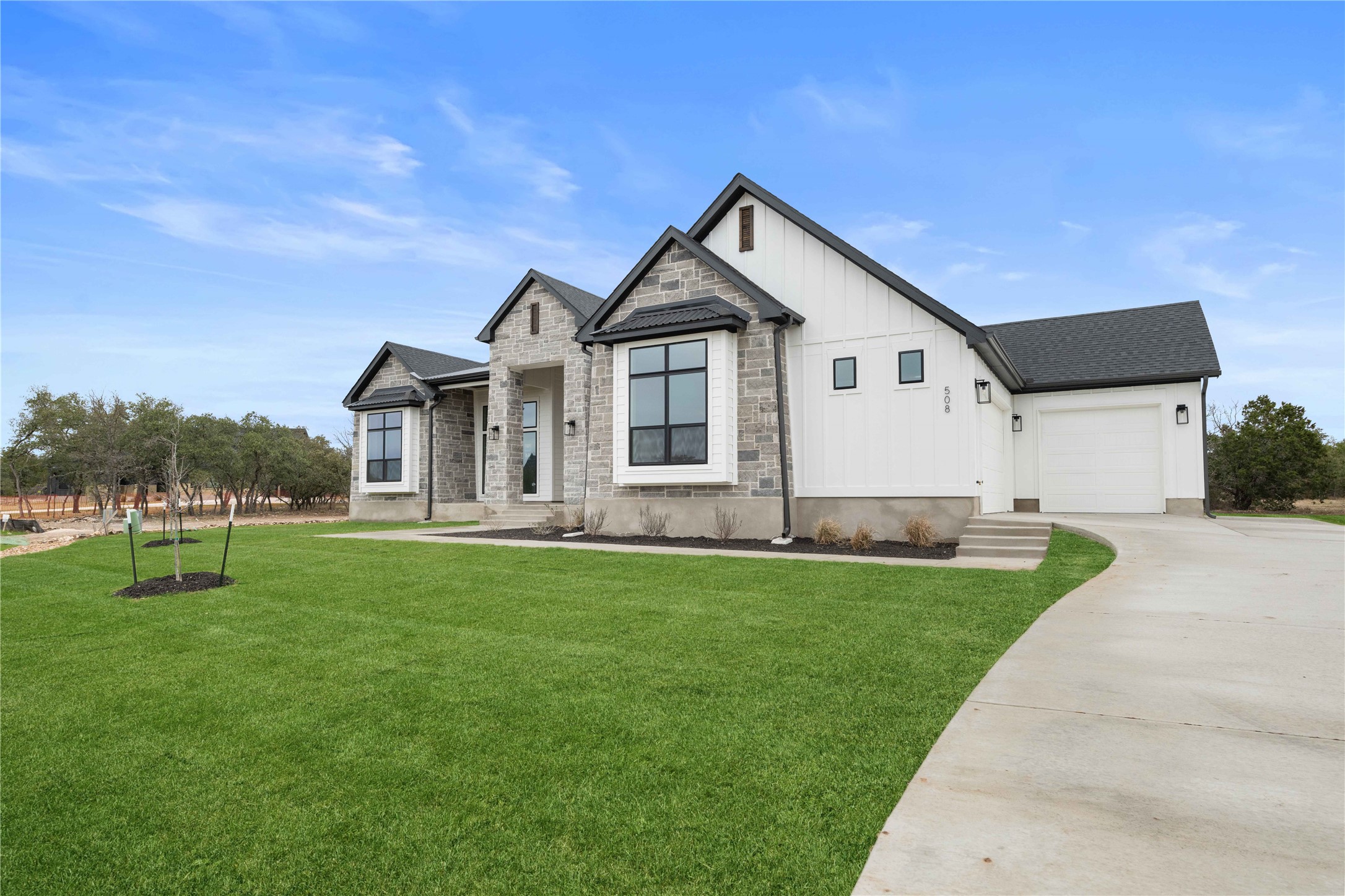 520 Vale Pond Spur Georgetown, TX 78633 - Photo 5 of 32 a front view of a house with a yard