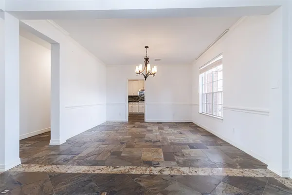 a bathroom with a sink a large mirror and a shower