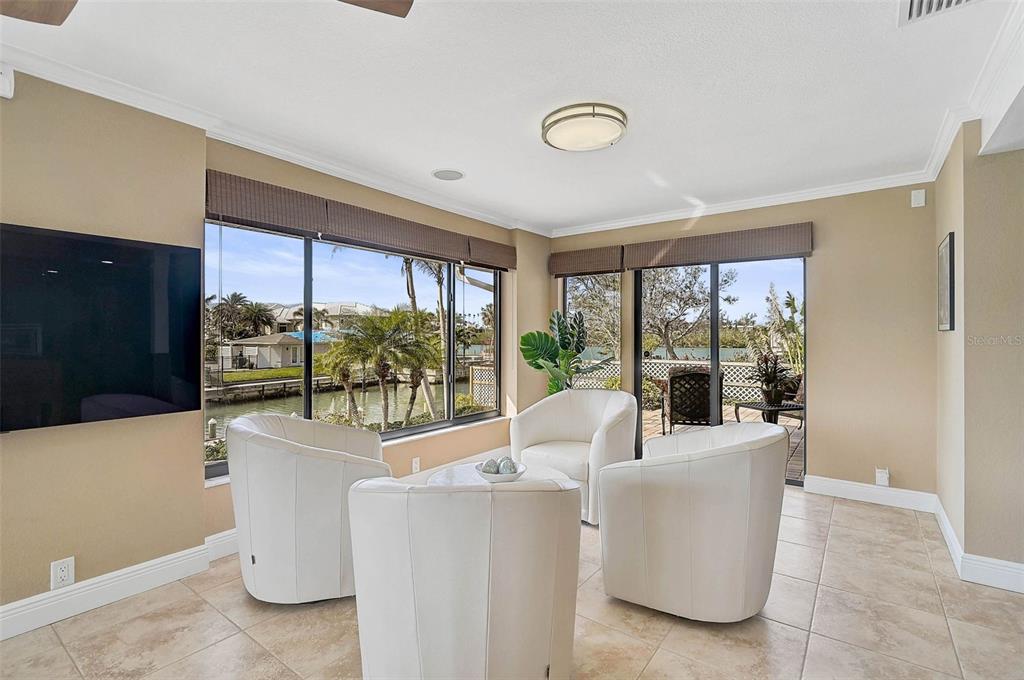641 Bayshore Road Nokomis, FL 34275 - Photo 35 of 63 a living room with furniture and a large window