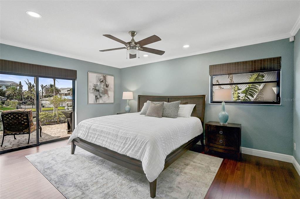 641 Bayshore Road Nokomis, FL 34275 - Photo 37 of 63 a bedroom with a large bed and a large window