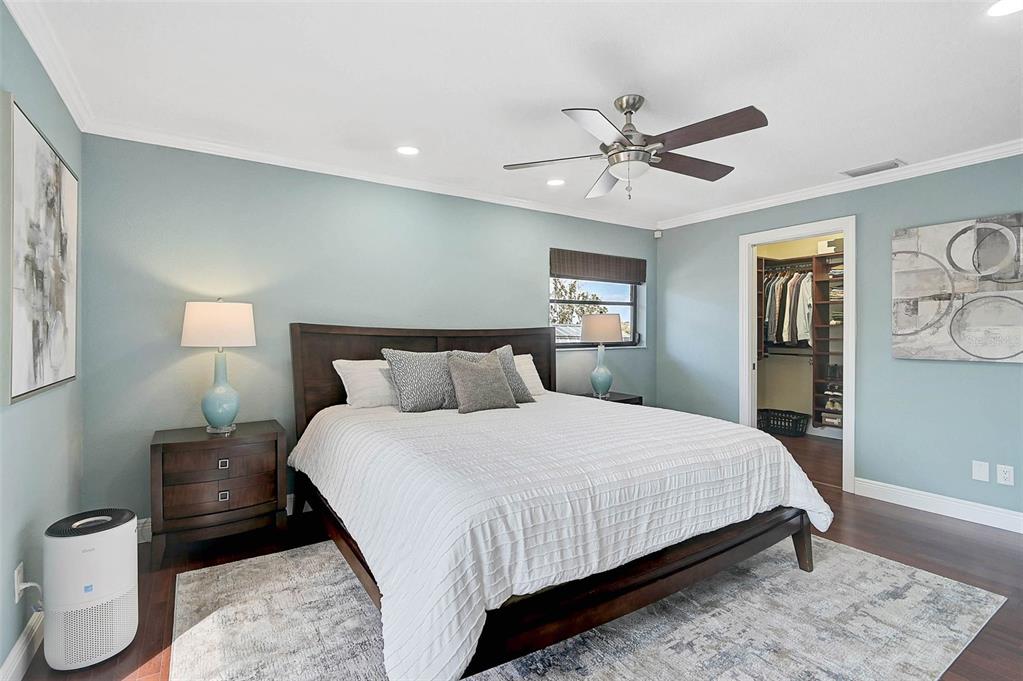 641 Bayshore Road Nokomis, FL 34275 - Photo 39 of 63 a bedroom with bed and wooden floor