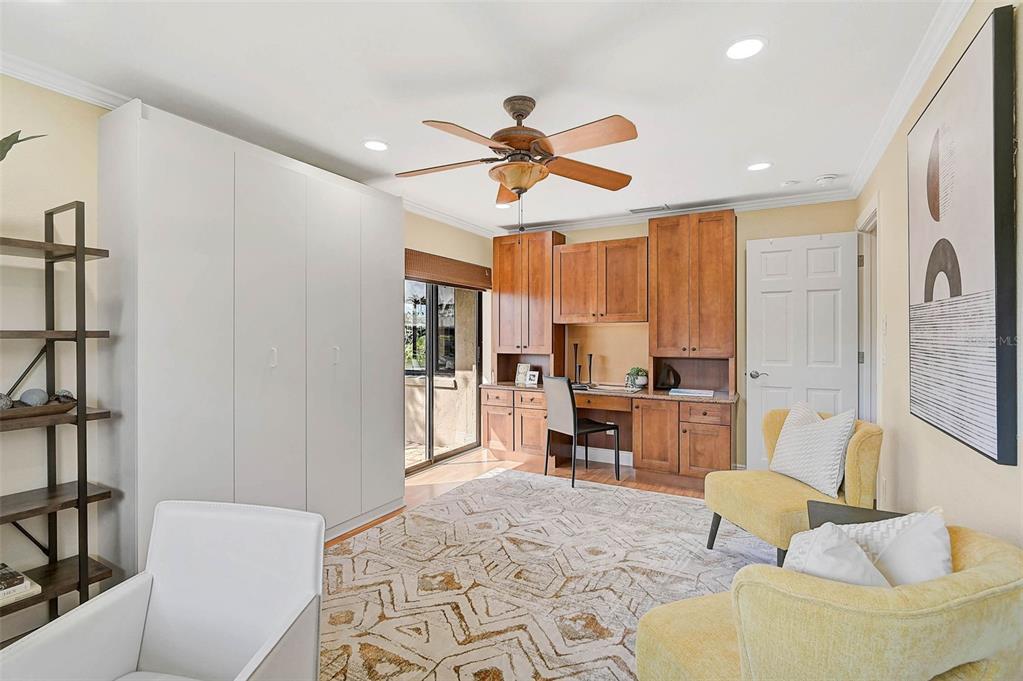 641 Bayshore Road Nokomis, FL 34275 - Photo 44 of 63 a living room with furniture and a window
