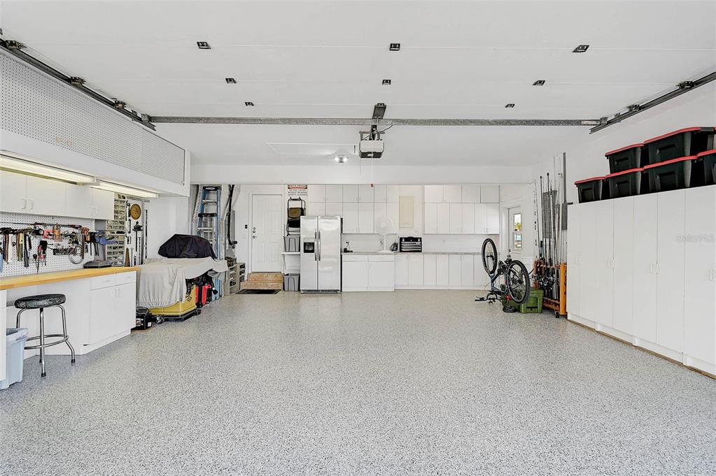 641 Bayshore Road Nokomis, FL 34275 - Photo 48 of 63 a view of a livingroom with furniture and cars
