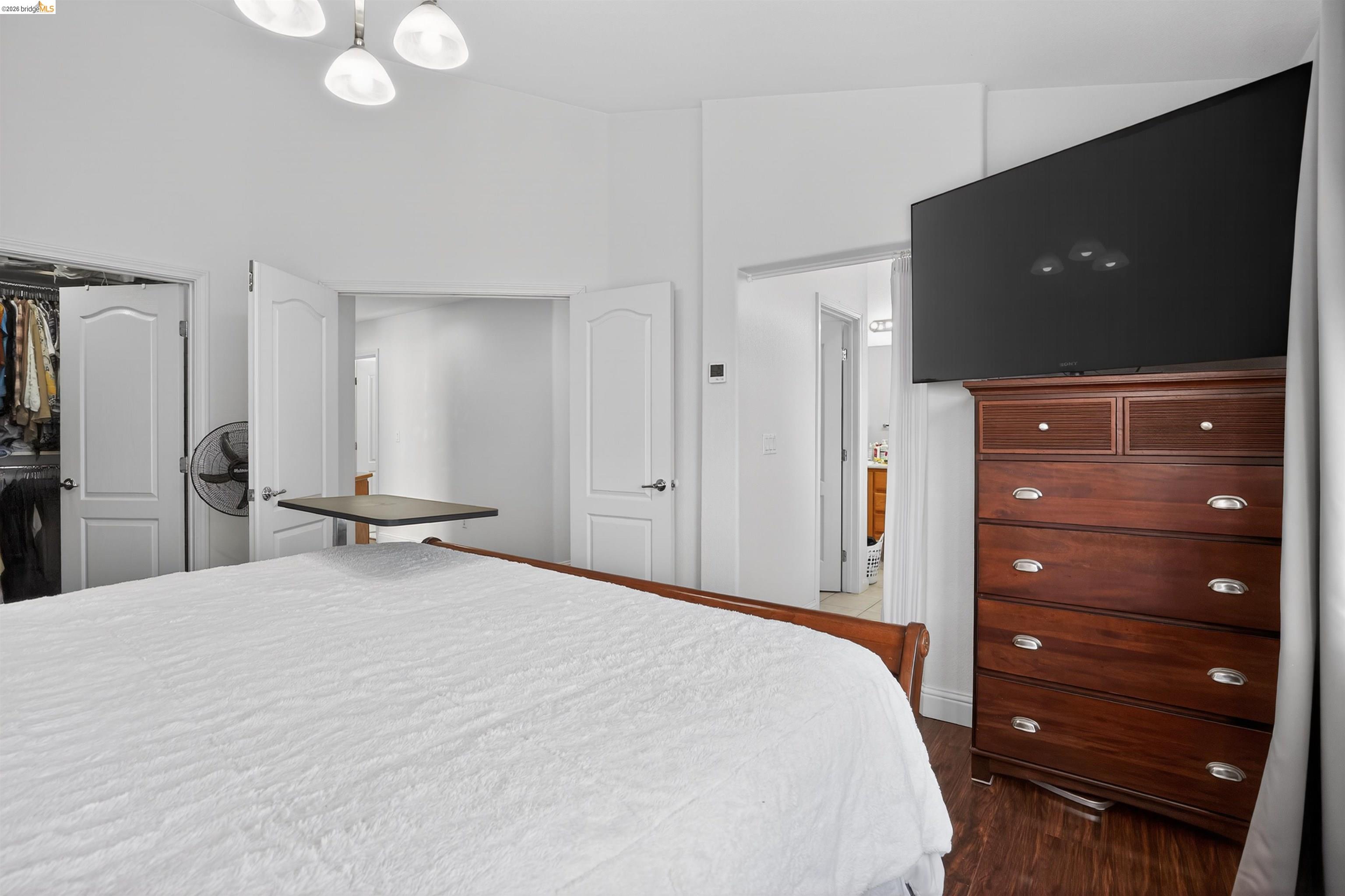 1221 Andrea Way Vallejo, CA 94591 - Photo 17 of 29 Vaulted ceiling with a contemporary flush-mount light fixture