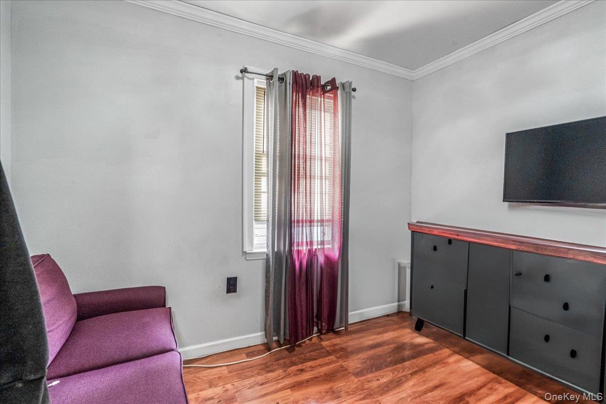 14428 158th Street Queens, NY 11434 - Photo 12 of 17 a view of a livingroom with a flat screen tv