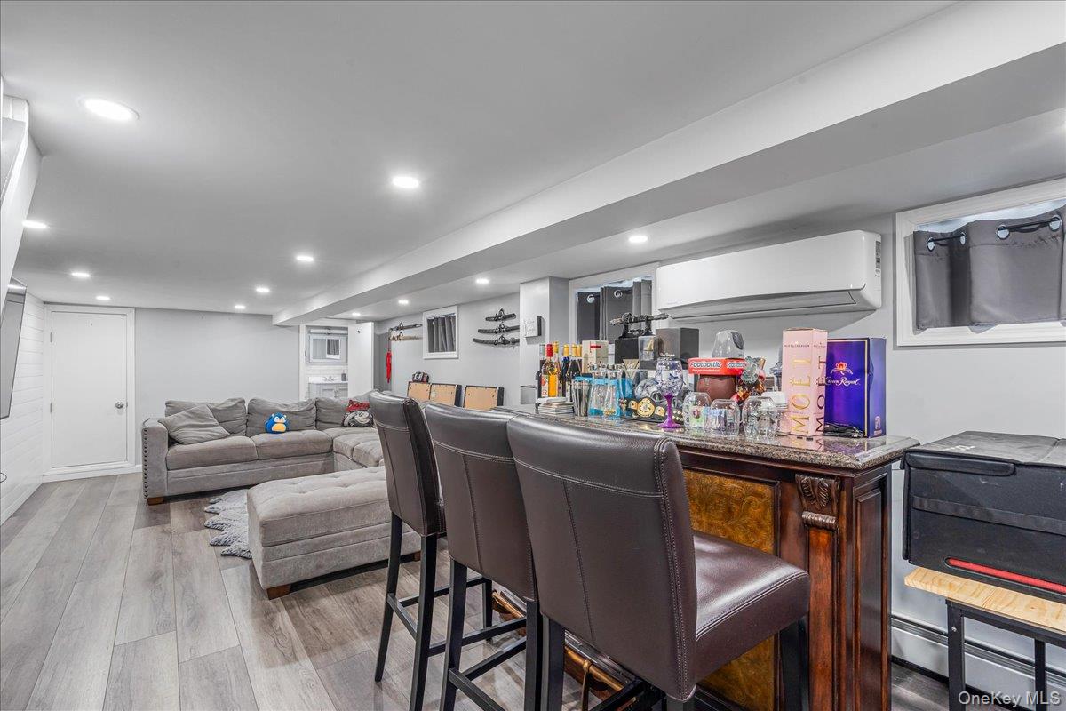 14428 158th Street Queens, NY 11434 - Photo 15 of 17 a living room with furniture and kitchen view