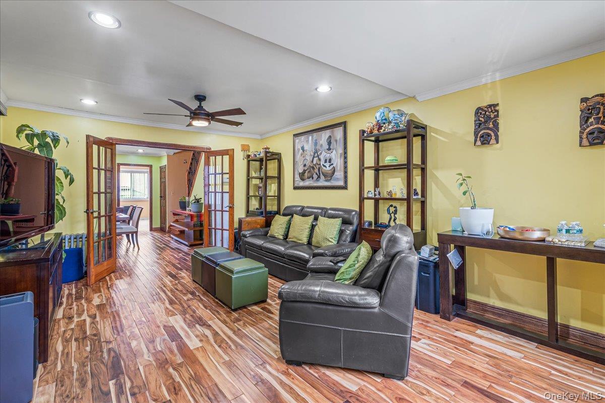 14428 158th Street Queens, NY 11434 - Photo 4 of 17 a living room with furniture and a flat screen tv