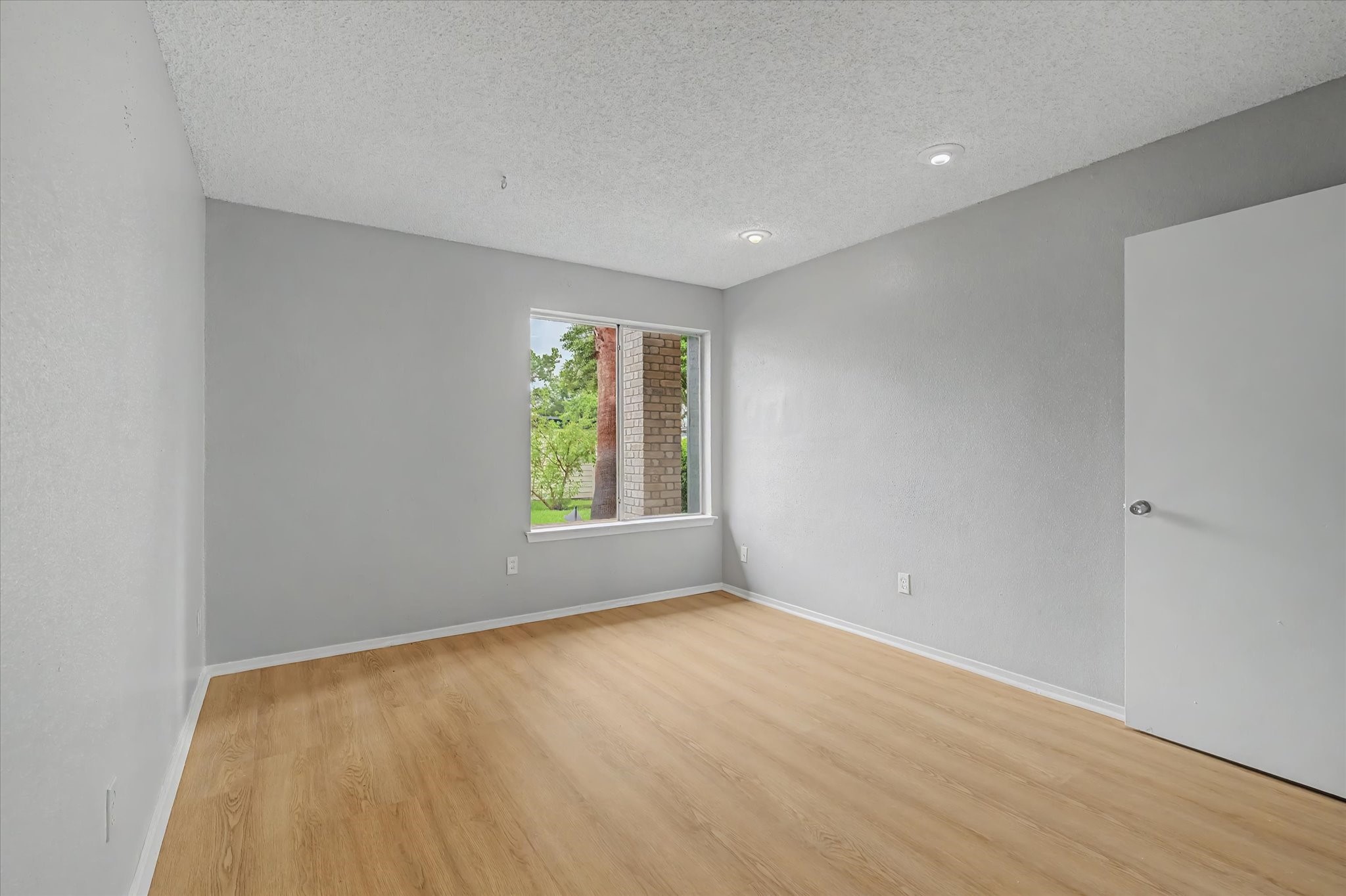 7330 South Dairy Ashford Road Houston, TX 77072 - Photo 18 of 33 a view of an empty room with a window