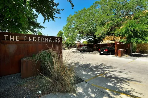 a view of a building with a street