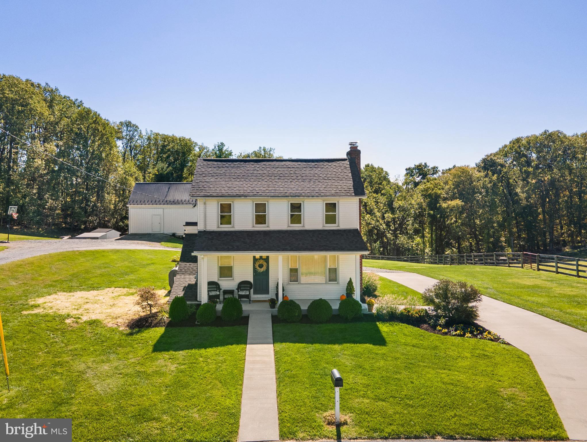 a view of a swimming pool with a garden