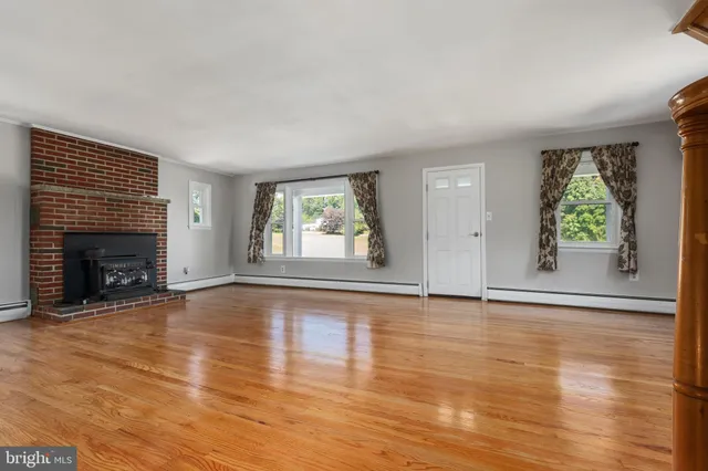 a kitchen with a refrigerator sink and stove