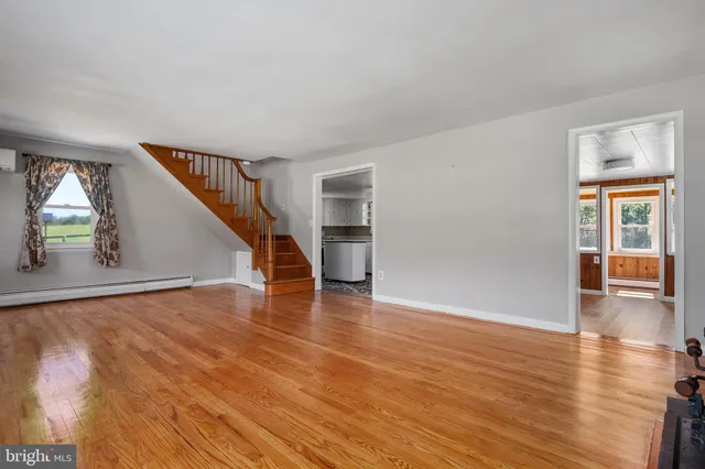 a kitchen with stainless steel appliances granite countertop a stove and a refrigerator