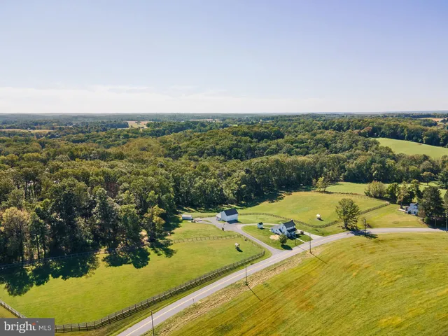 a bathroom with a sink mirror and vanity
