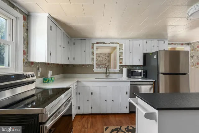 a view of hallway with windows