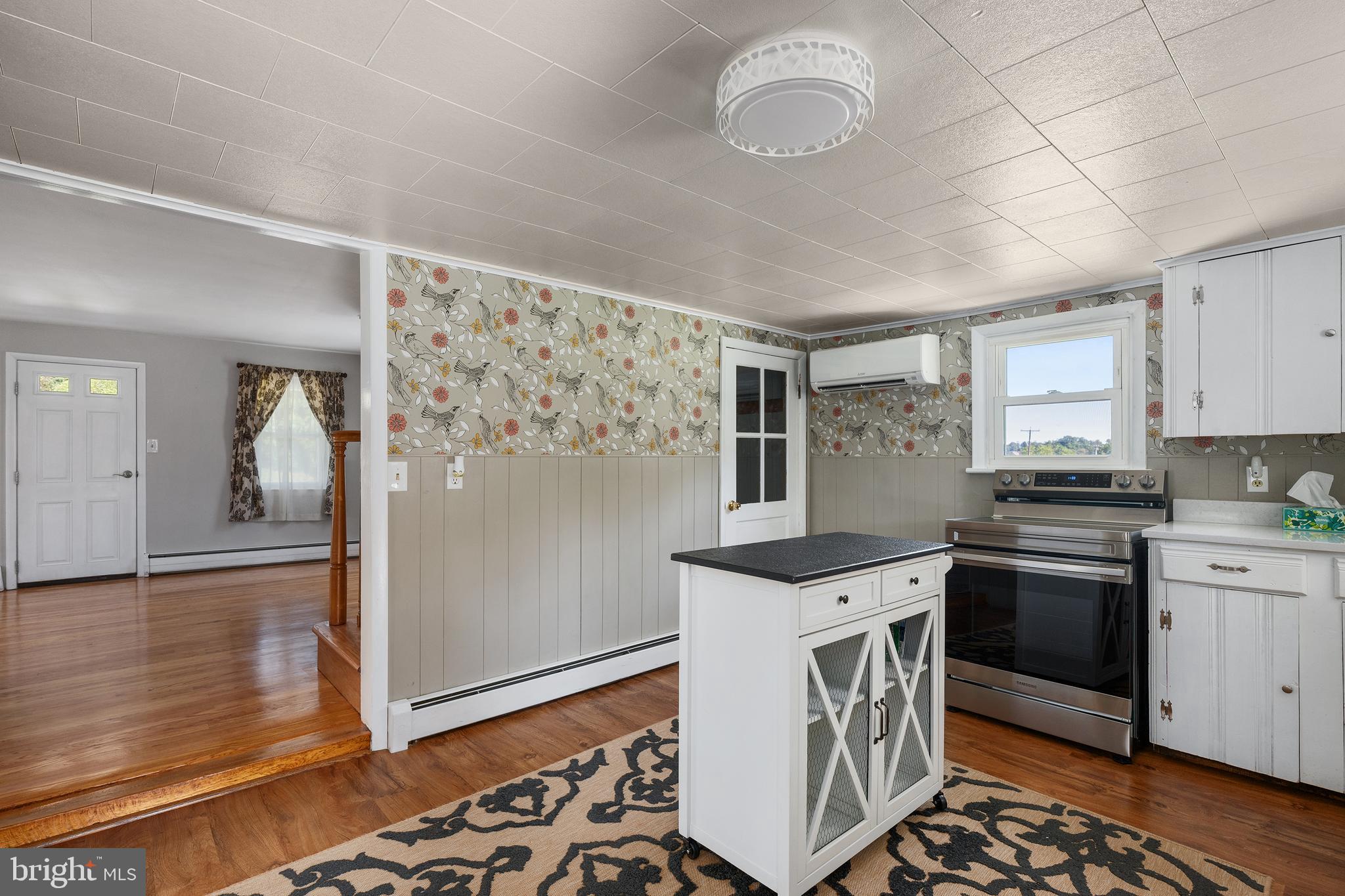 16357 Trenton Road Upperco, MD 21155 - Photo 24 of 68 a kitchen with stainless steel appliances granite countertop a stove and a refrigerator