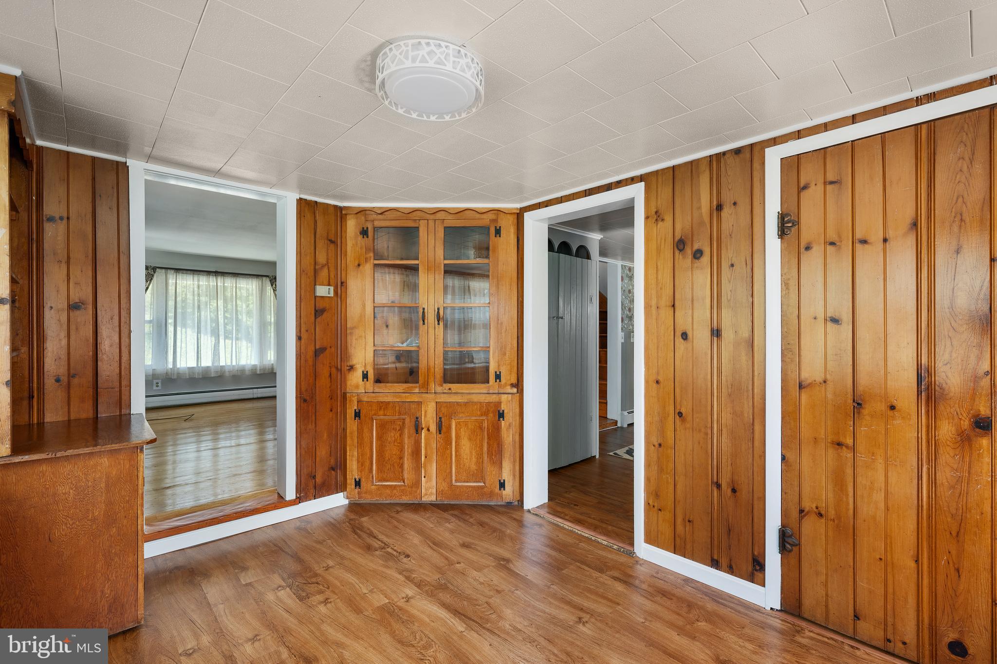16357 Trenton Road Upperco, MD 21155 - Photo 26 of 68 an empty room with wooden floor and windows