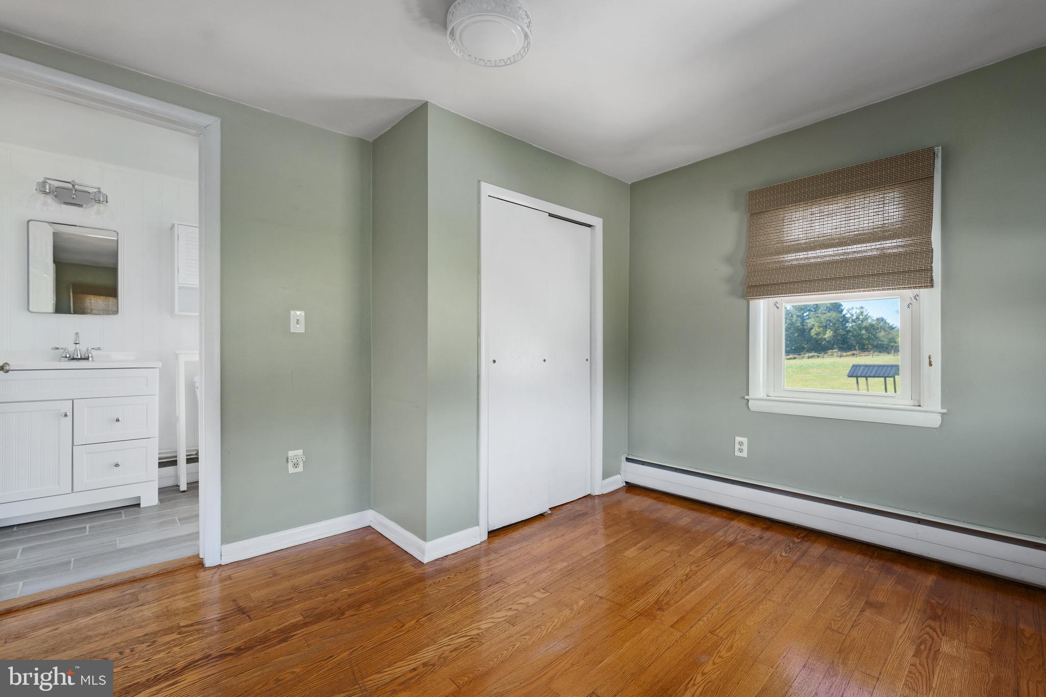 16357 Trenton Road Upperco, MD 21155 - Photo 35 of 68 a view of empty room with wooden floor and fan