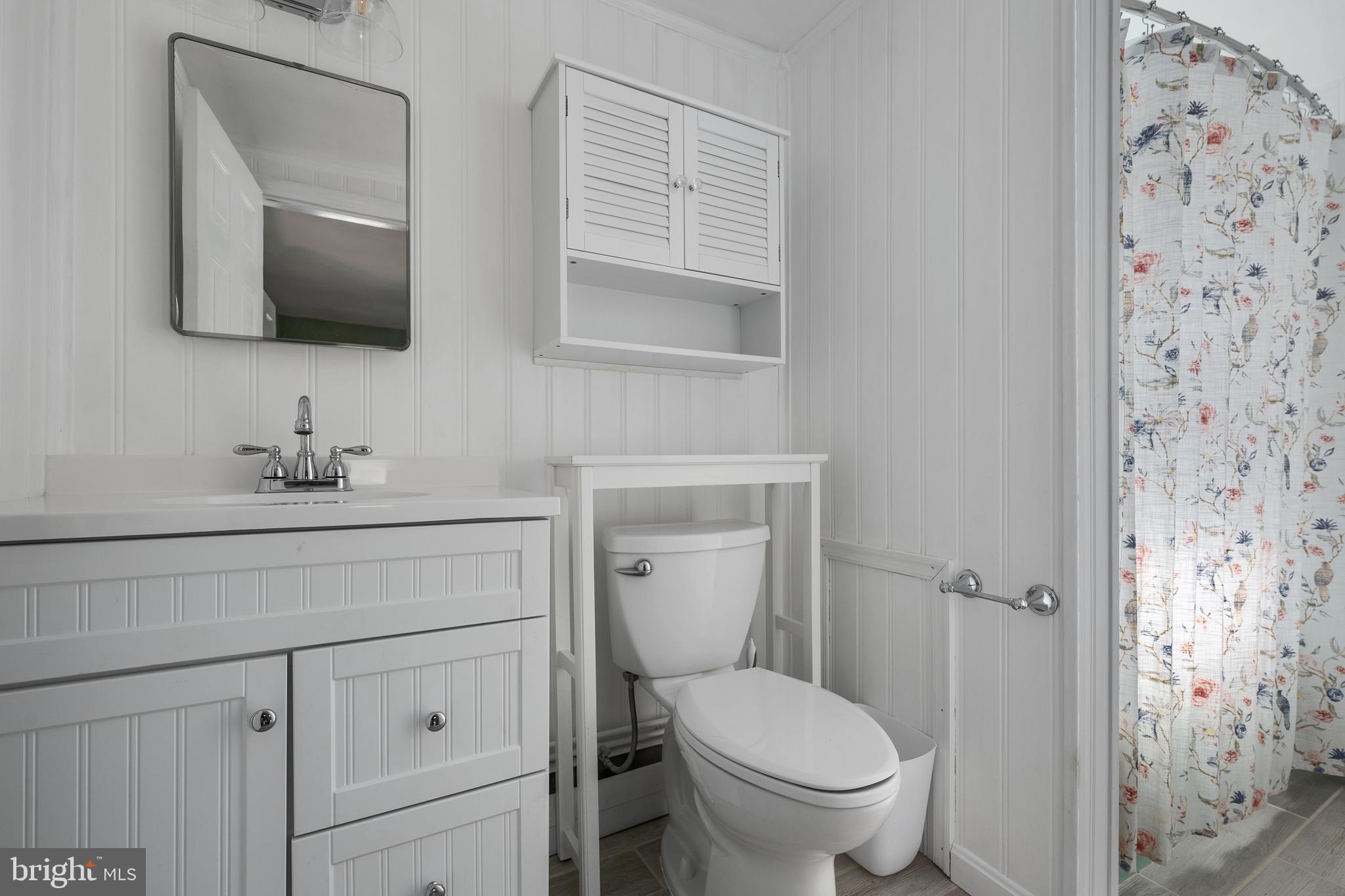 16357 Trenton Road Upperco, MD 21155 - Photo 37 of 68 a bathroom with a toilet sink and mirror