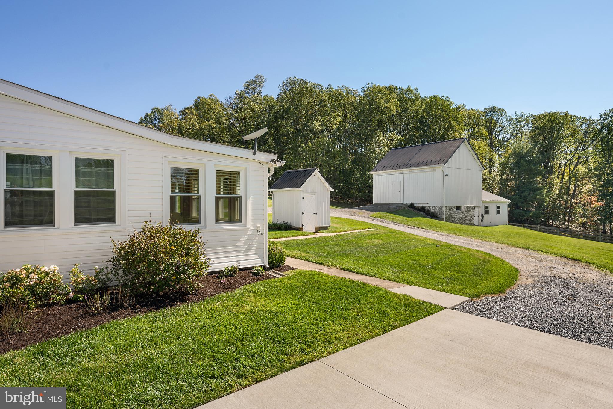 16357 Trenton Road Upperco, MD 21155 - Photo 41 of 68 a view of a house with backyard and garden
