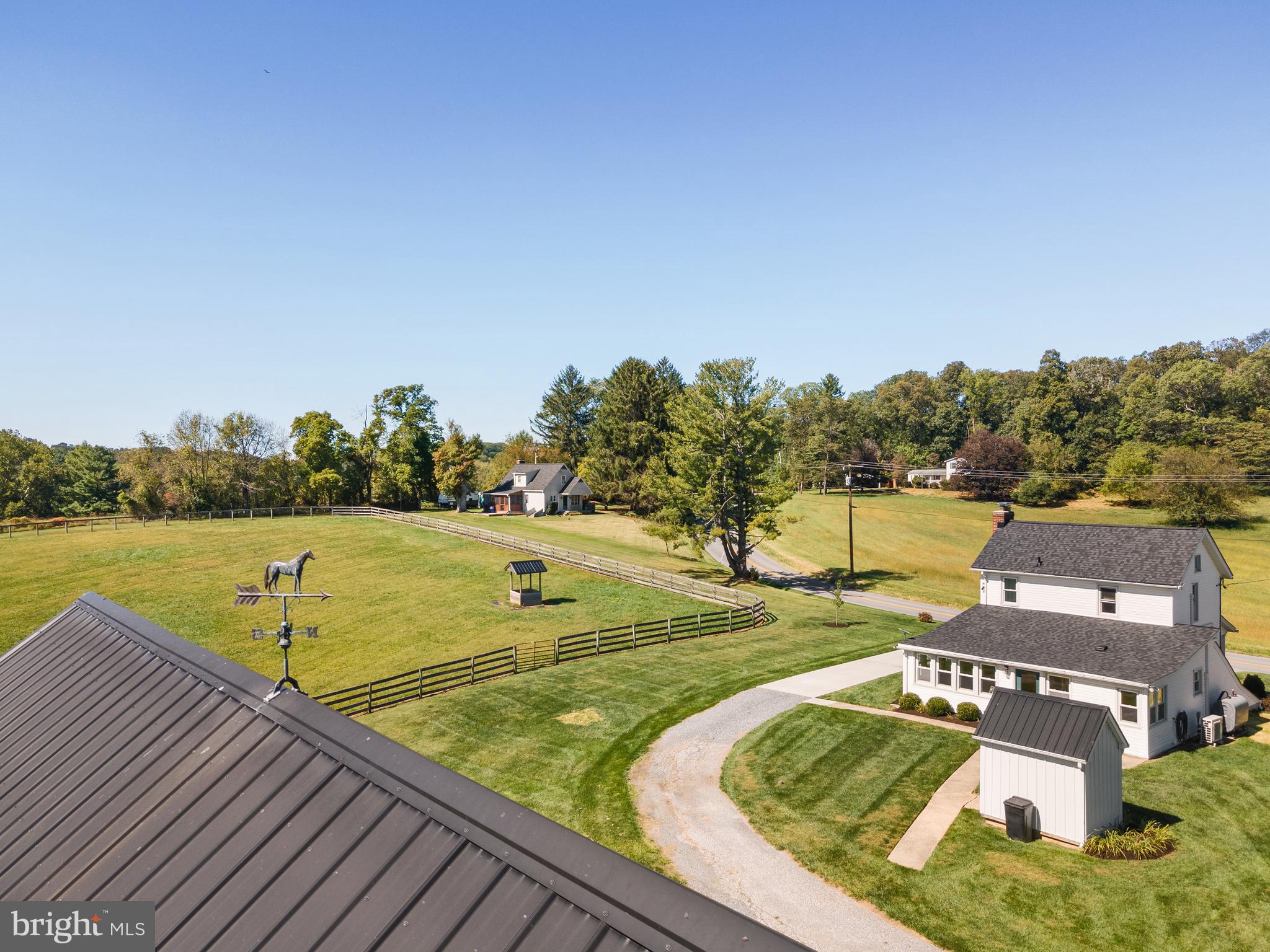 16357 Trenton Road Upperco, MD 21155 - Photo 42 of 68 a view of a swimming pool with a lake view