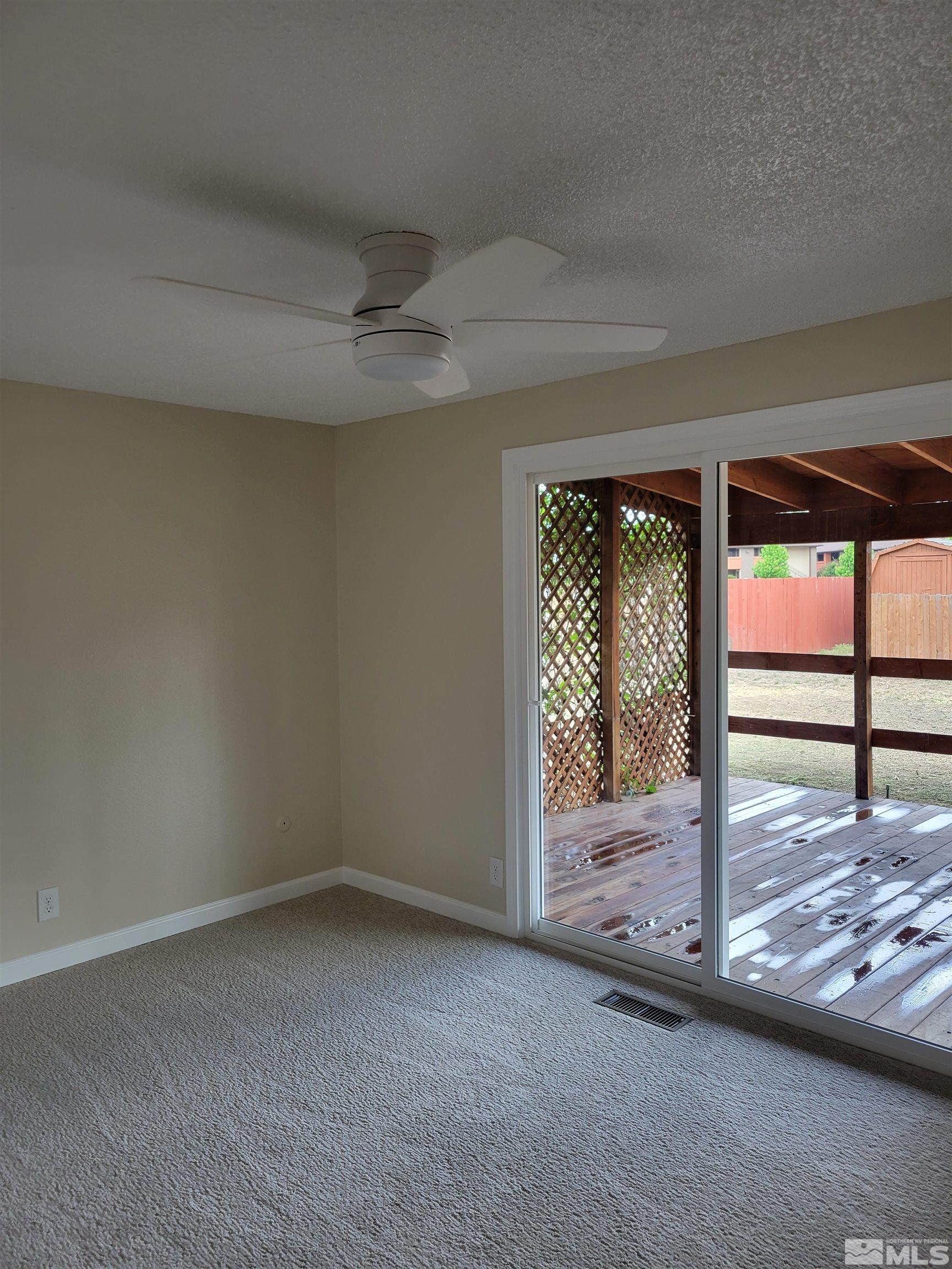 9085 Fremont Way Reno, NV 89506 - Photo 6 of 10 a view of a garage