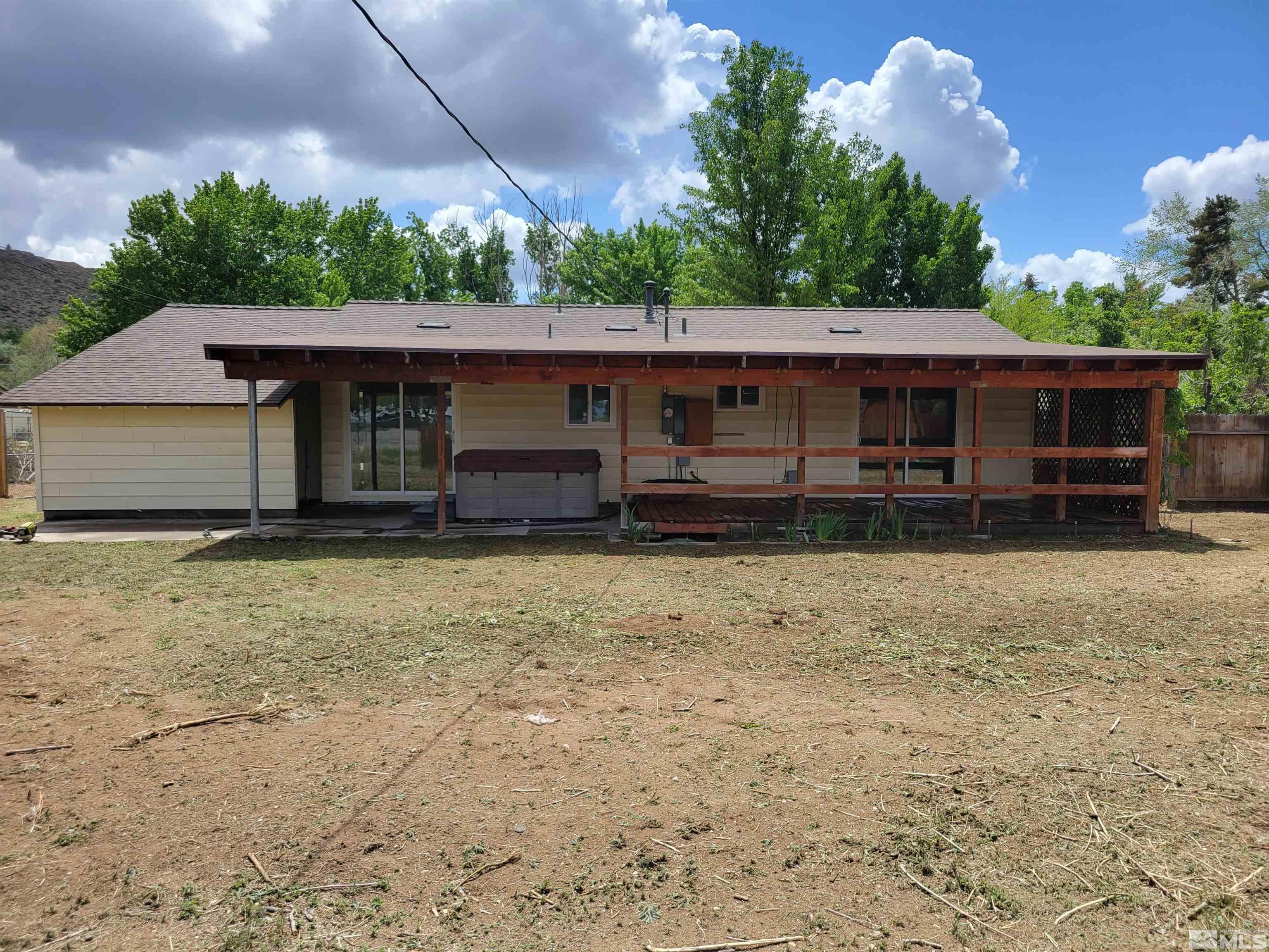 9085 Fremont Way Reno, NV 89506 - Photo 10 of 10 a front view of a house with a yard