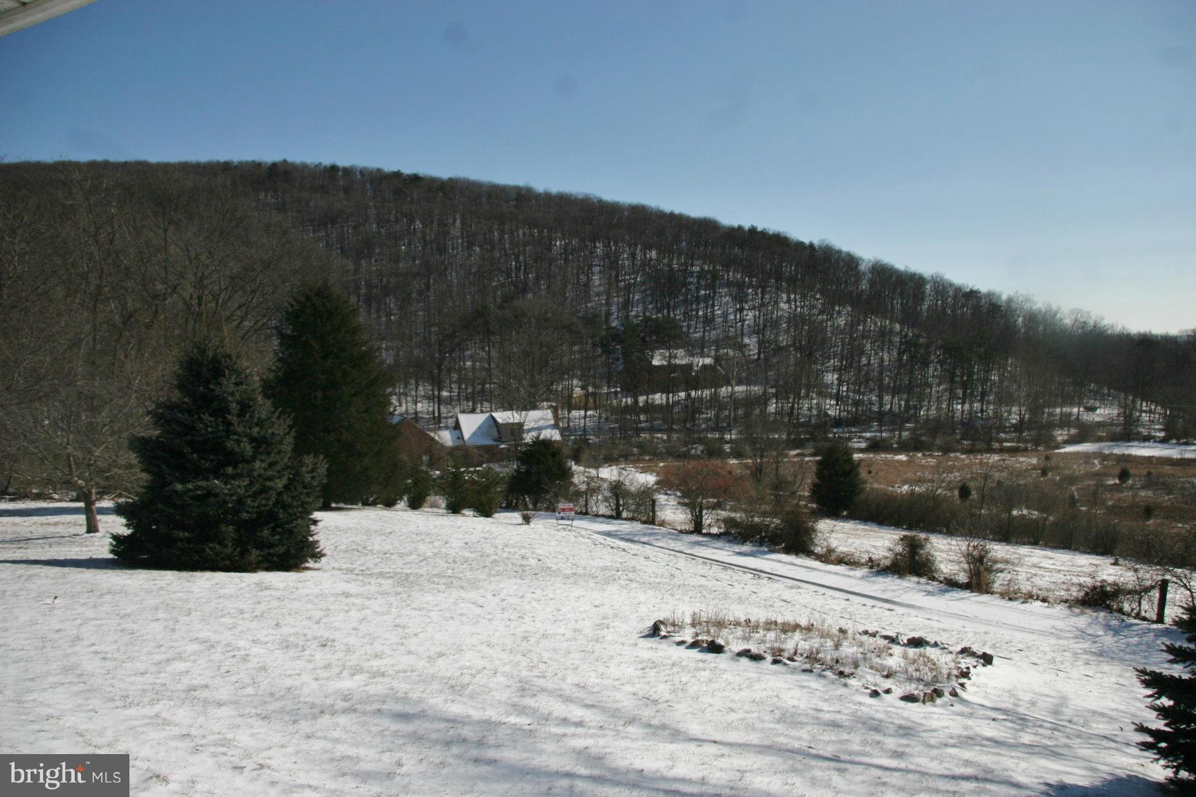 13102 Draper Road Clear Spring, MD 21722 - Photo 23 of 26 a view of a snow on the side of a road