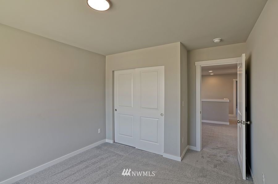 1007 Yew Avenue Sultan, WA 98294 - Photo 17 of 18 an empty room with closet area