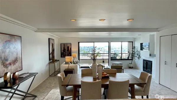 a view of a dining room with furniture window and outside view