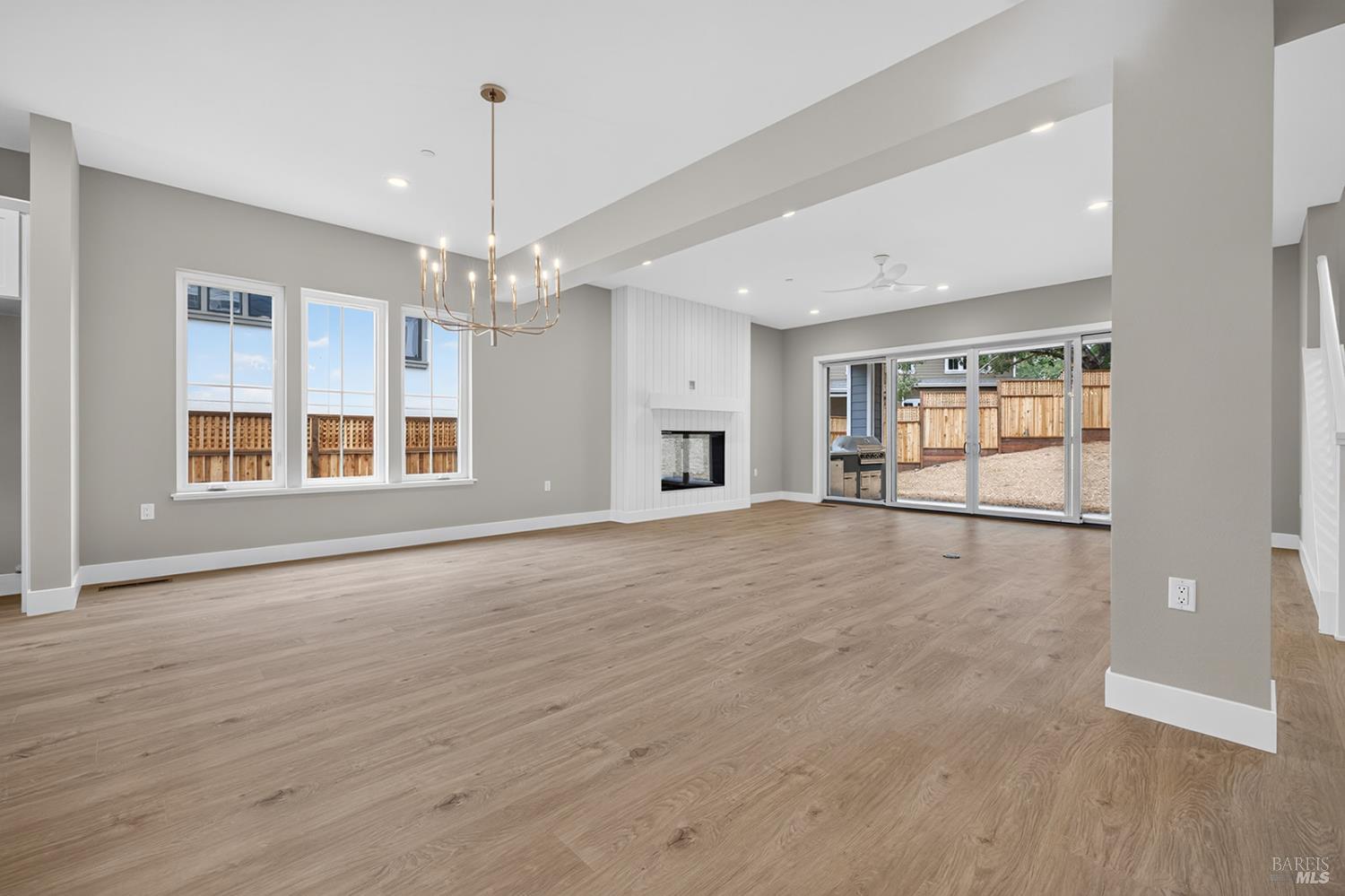 1907 Carlile Place Santa Rosa, CA 95403 - Photo 3 of 55 Plenty of light shines into this great space to entertain with the windows and sliding glass doors to the large backyard.