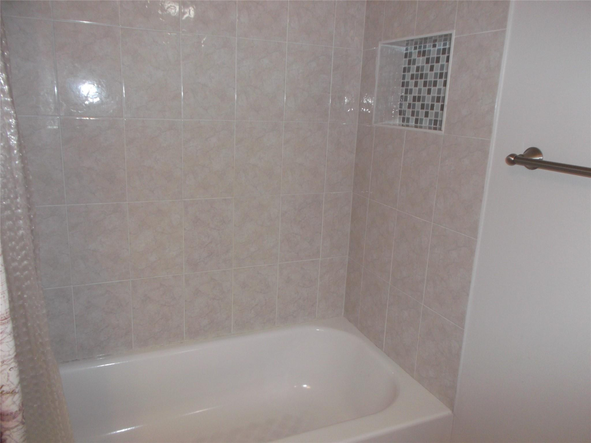 2955 Riverside Drive, Unit 103 Coral Springs, FL 33065 - Photo 10 of 26 a close up of a bathtub