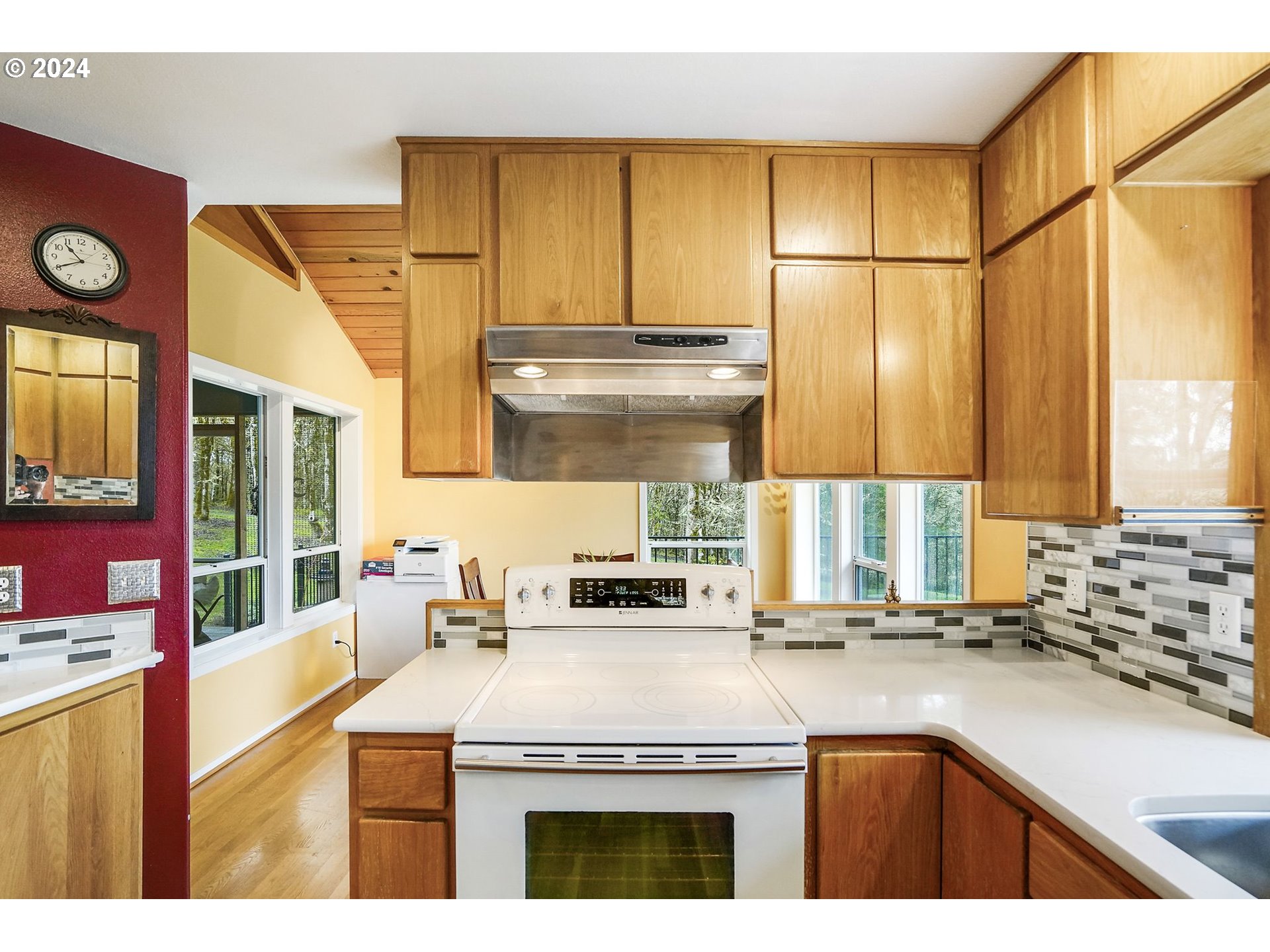 2080 Cherry Knoll Road Dallas, OR 97338 - Photo 13 of 48 a kitchen with a sink stove and cabinets