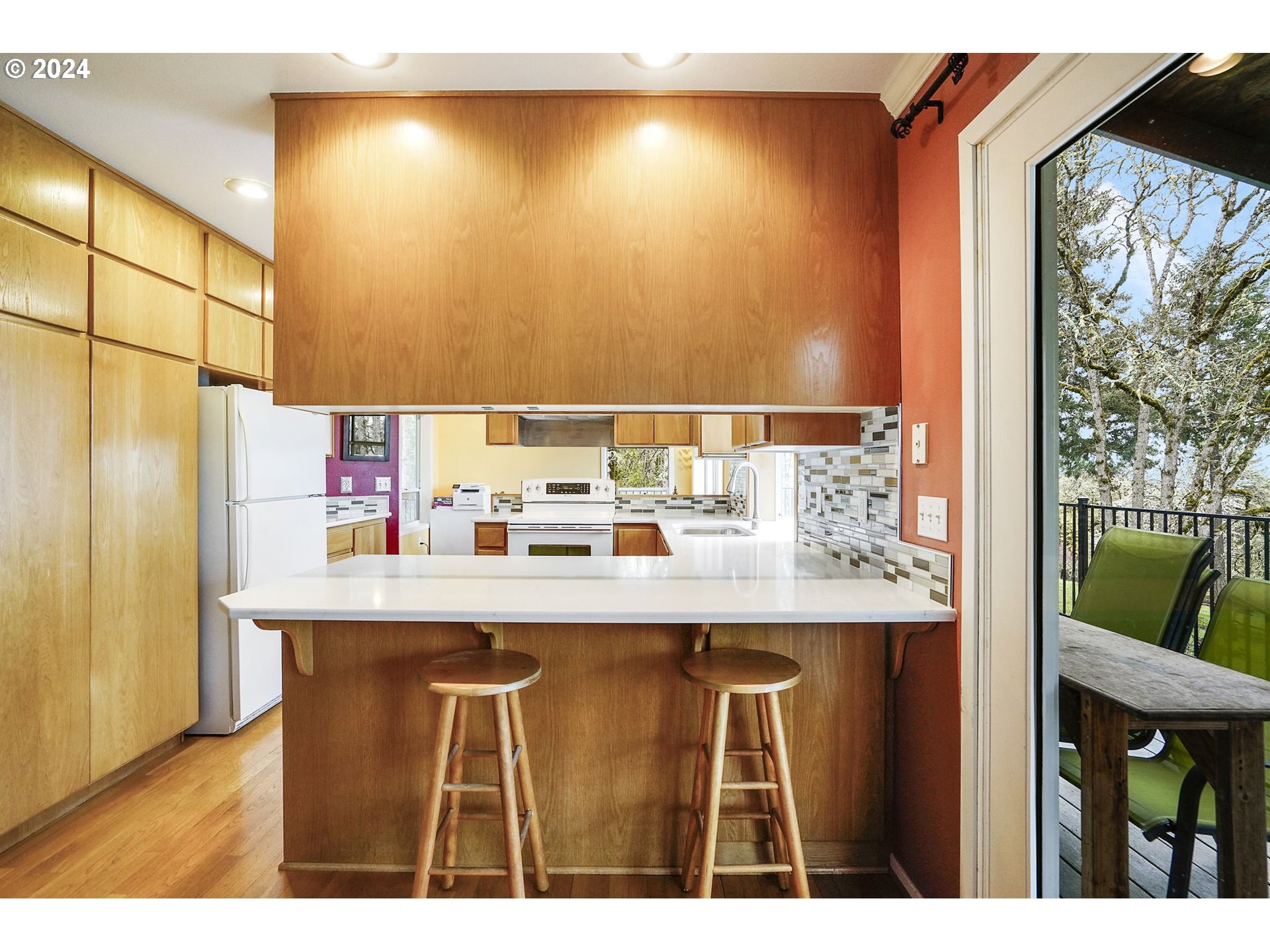 2080 Cherry Knoll Road Dallas, OR 97338 - Photo 15 of 48 a kitchen with a sink cabinets and a table