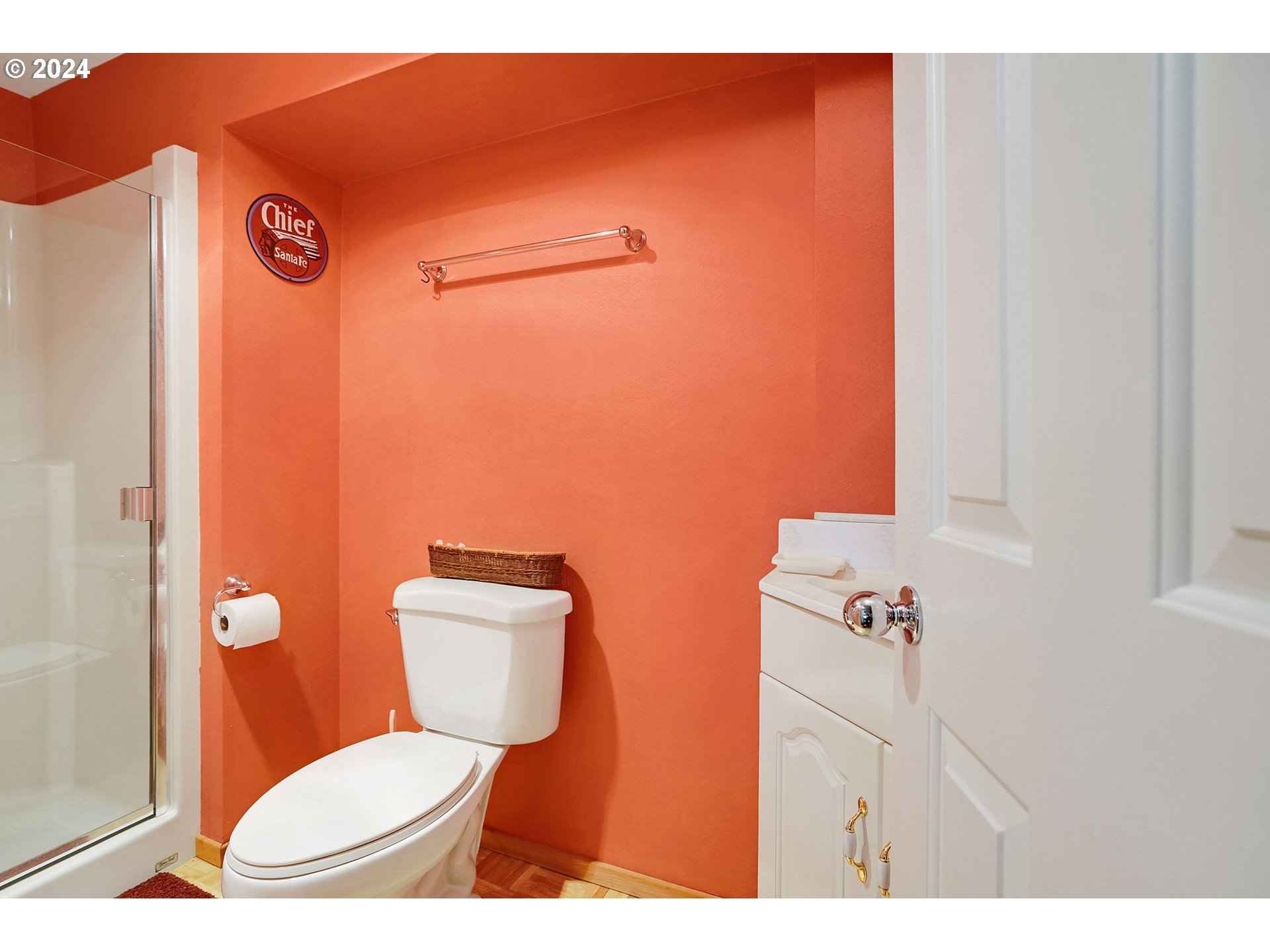 2080 Cherry Knoll Road Dallas, OR 97338 - Photo 25 of 48 a bathroom with a toilet and a shower curtain