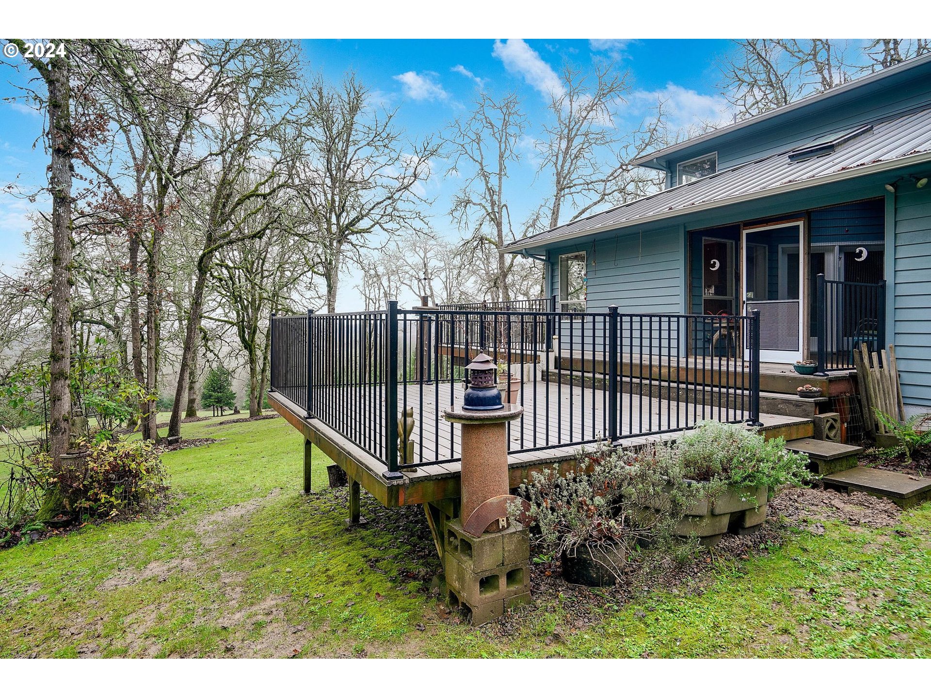 2080 Cherry Knoll Road Dallas, OR 97338 - Photo 38 of 48 a view of a house with backyard and a tree