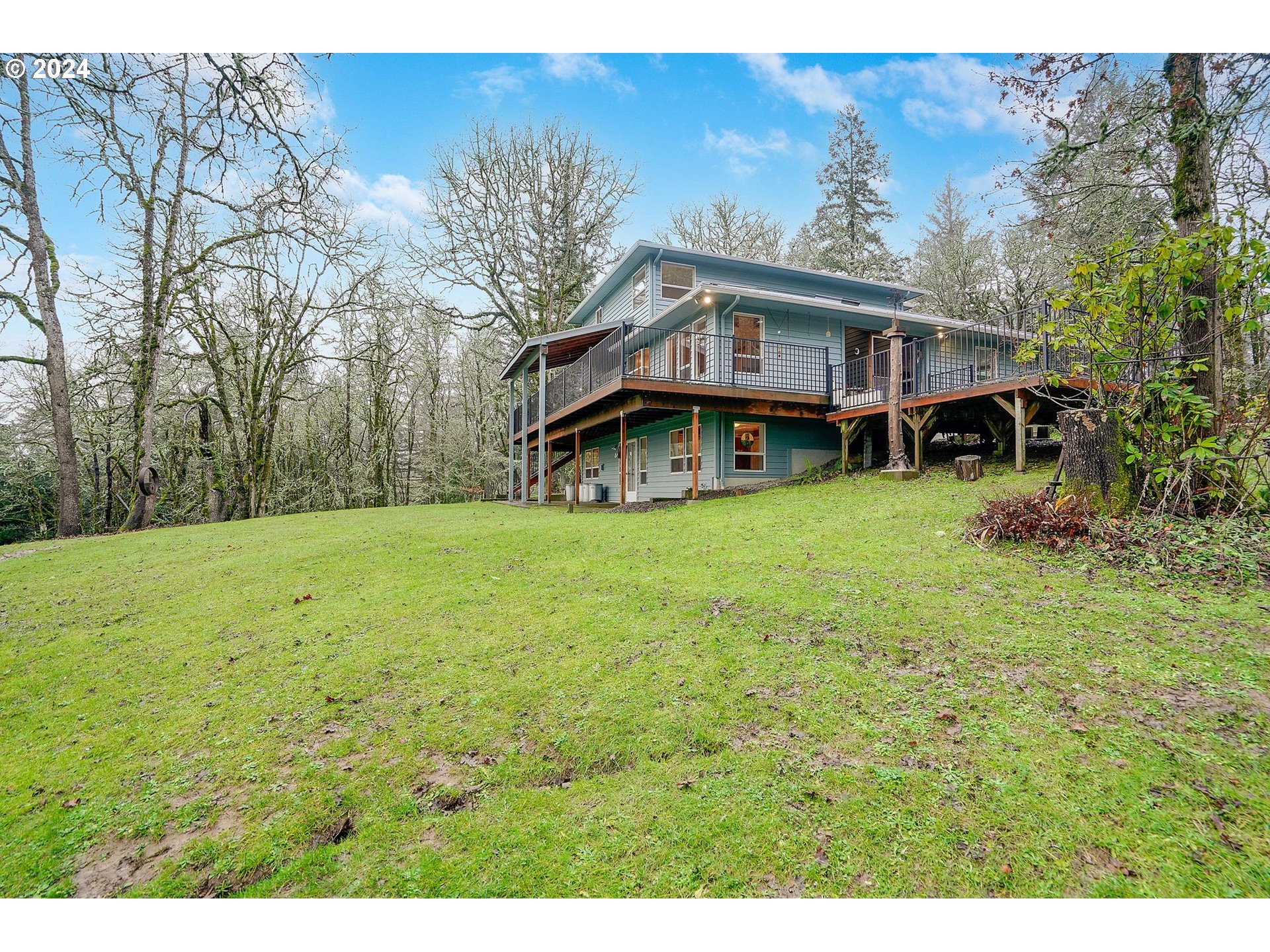 2080 Cherry Knoll Road Dallas, OR 97338 - Photo 44 of 48 a front view of house with yard and trees